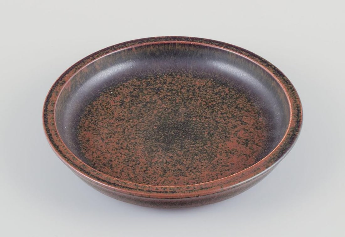 Saxbo, Denmark. Ceramic bowl with brown glaze. Approx. 1940s.: Saxbo, Denmark. Ceramic bowl with brown glaze. Approximately 1940s. Ying Yang mark. Perfect condition. First factory quality. Dimensions: D 24.0 cm x H 4.0 cm.; Saxbo, Denmark. Ceramic bowl with