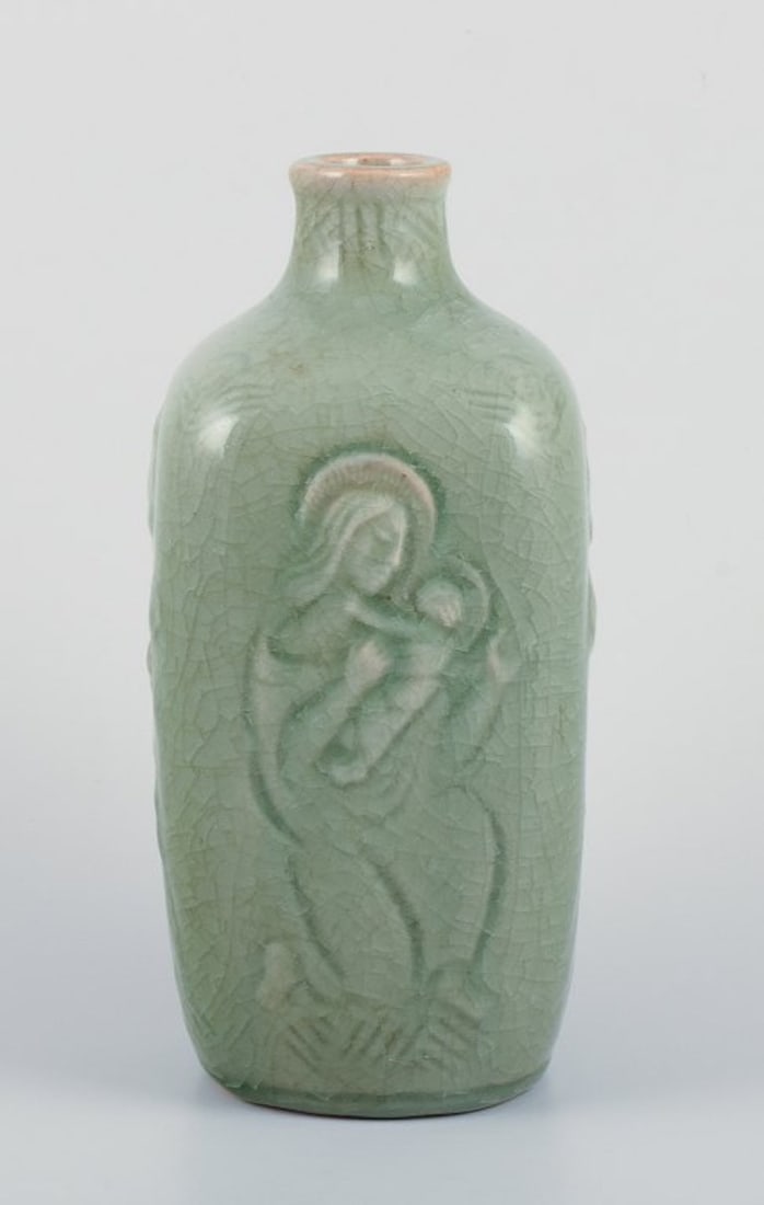Jais Nielsen for Royal Copenhagen. Ceramic vase in celadon glaze with religious motifs. 1940s. - 2
