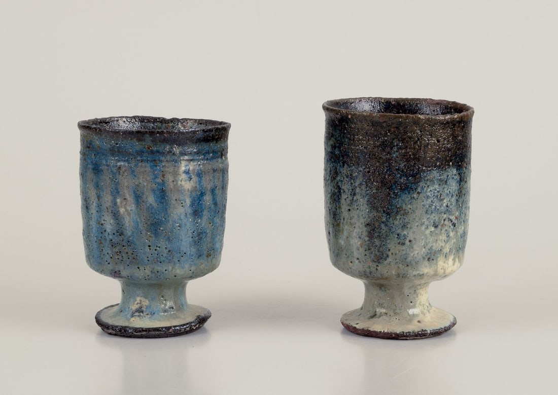 Gutte Eriksen, Denmark. Two cups in ceramic, raku technique, flowing lava glaze. Approx. 1960. (1 of 8)