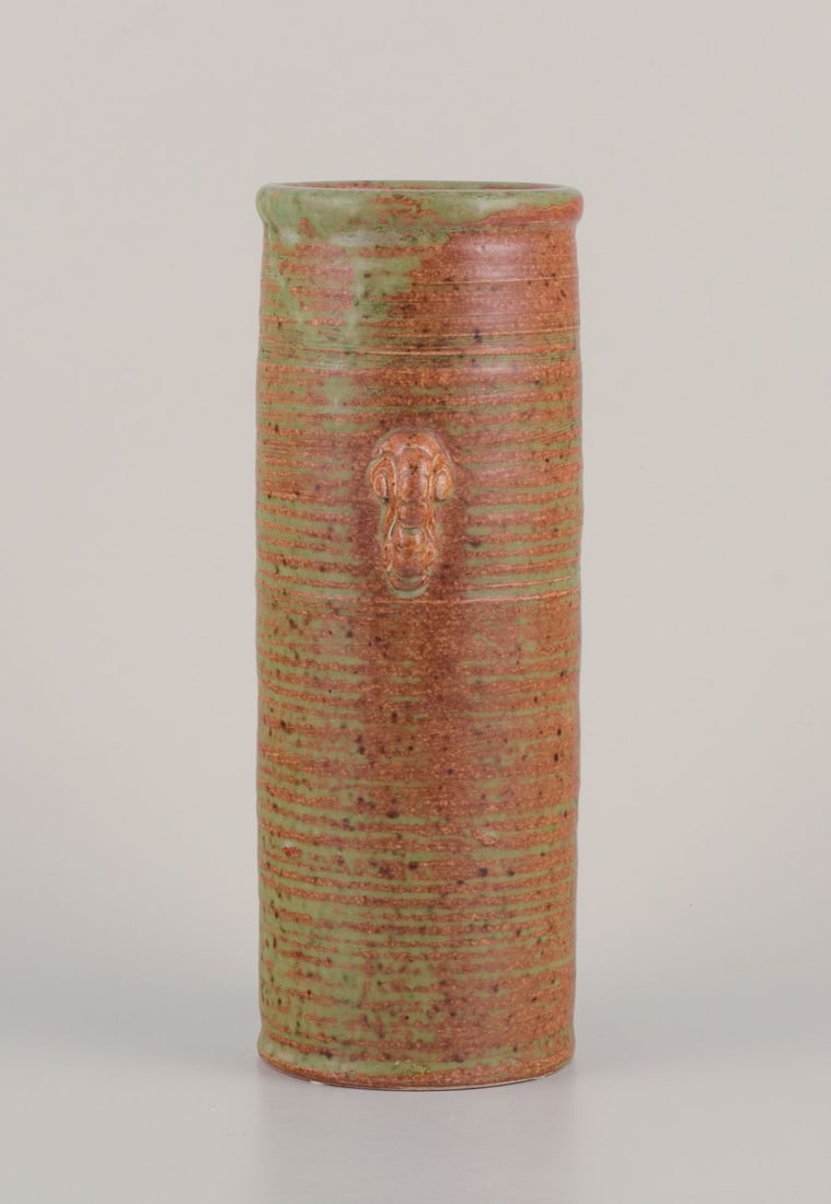 Patrick Nordstrom for Isle, Denmark. Large cylindrical ceramic vase. 1924.: Patrick Nordstrom for Isle, Denmark. Large cylindrical unique ceramic vase. Glaze in shades of green and brown. Signed and dated 1924. In perfect condition. Dimensions: Height 25.6 cm. x width 9.5 cm.