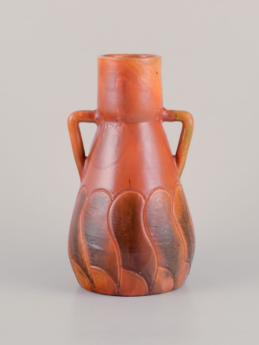 Martin Mortensen, Danish ceramicist. Ceramic Art Nouveau vase with handles.: Martin Mortensen (1874-1949), Danish ceramicist, own workshop. Ceramic Art Nouveau vase with handles. Glaze in ochre yellow and green shades. Signed MM 1904. In excellent condition. Dimensions: Height