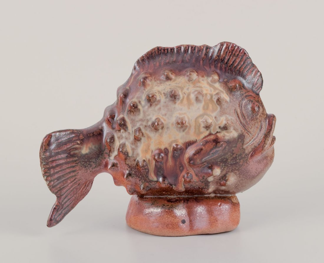 European studio ceramist. Large ceramic figure of fish. Ca 1970s.: European studio ceramist. Large ceramic figure of a fish. Glaze in brownish shades. Circa 1970s. Unmarked. Perfect condition. Dimensions: L 20.0 cm. x Height 17.0 cm. Reserve: $196.00 Shipping: Domest