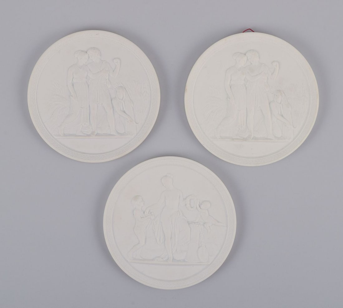 Royal Copenhagen. Three biscuit wall plaques, after motifs by Bertil Thorvaldsen. (1 of 7)