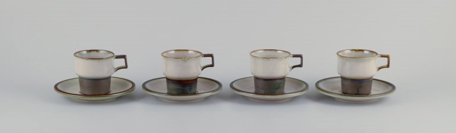Bing and Grondahl, Tema. Four sets of coffee cups and saucers in stoneware. 1970s.: Bing and Grondahl, Tema. Four sets of coffee cups in stoneware. From the 1970s. Model: 305. Marked. In perfect condition. First factory quality. Cup: Diameter 7.5 cm without handle x Height 7.2 cm. Sa