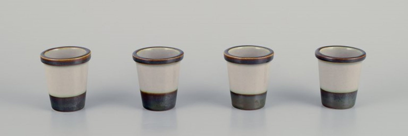 Bing and Grondahl, Tema. Four egg cups in stoneware. From the 1970s. - 2