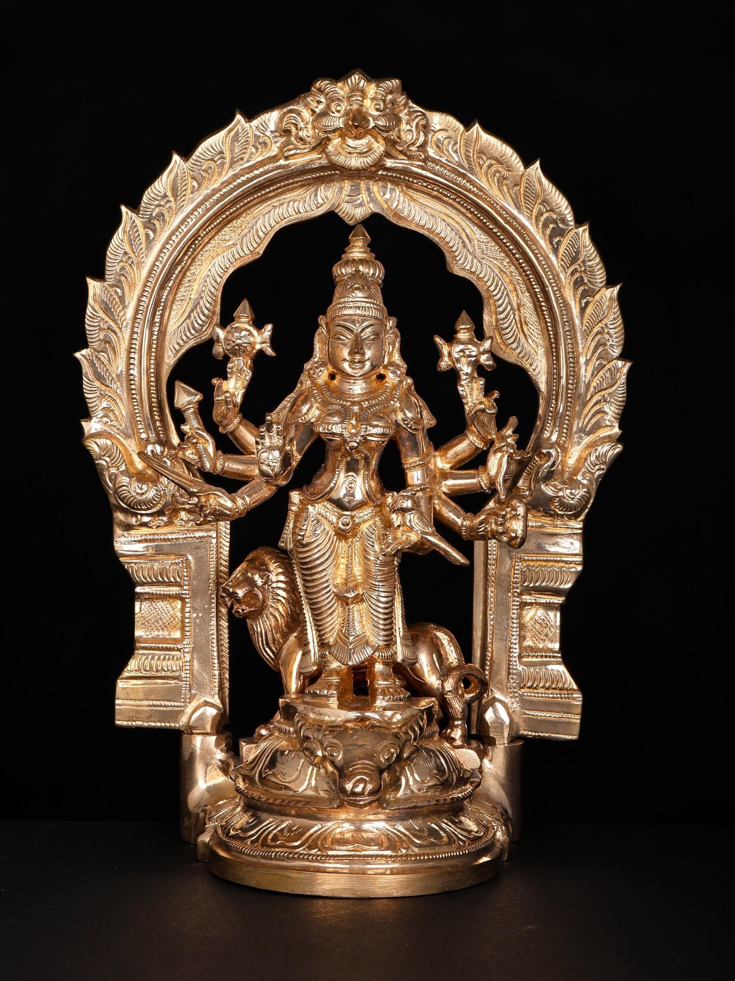 9" Eight Armed Standing Goddess Durga with Kirtimukha Arch | Bronze Statue: Title: 9" Eight Armed Standing Goddess Durga with Kirtimukha Arch | Bronze Statue Additional Information: itemcode: DDO054 Reserve: $491.00 Shipping: Domestic: Shipping rates are determined by destina