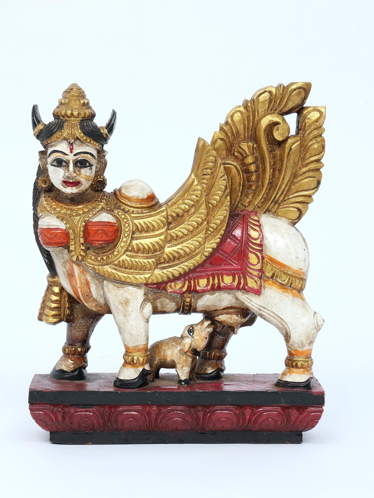 12" Colorful Goddess Kamadhenu with Calf | Wood Carving: Title: 12" Colorful Goddess Kamadhenu with Calf | Wood Carving Additional Information: itemcode: DDO598 Reserve: $284.00 Shipping: Domestic: Shipping rates are determined by destination