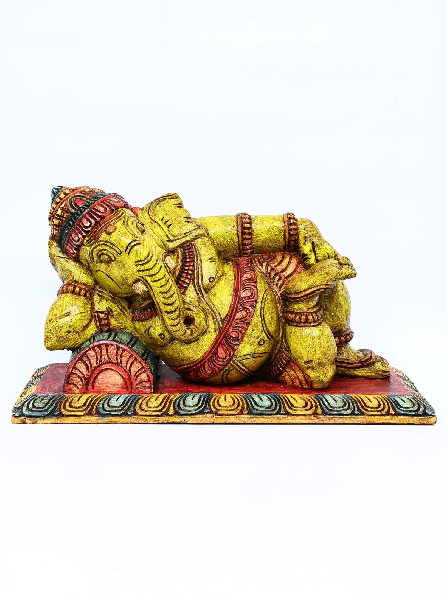 21" Relaxing Lord Ganesha | Wood Carved Statue: Title: 21" Relaxing Lord Ganesha | Wood Carved Statue Additional Information: itemcode: DDO172 Reserve: $409.00 Shipping: Domestic: Shipping rates are determined by destination International: Foreign