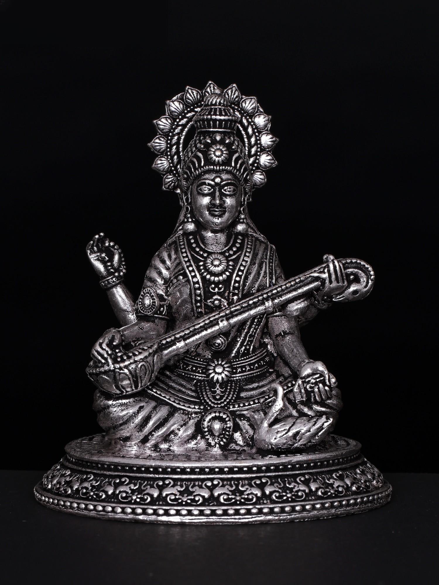 3" Small Superfine Four Armed Goddess Saraswati | Silver Plated Brass Statue: Title: 3" Small Superfine Four Armed Goddess Saraswati | Silver Plated Brass Statue Additional Information: itemcode: DDO142 Reserve: $73.00 Shipping: Domestic: Shipping rates are determined by