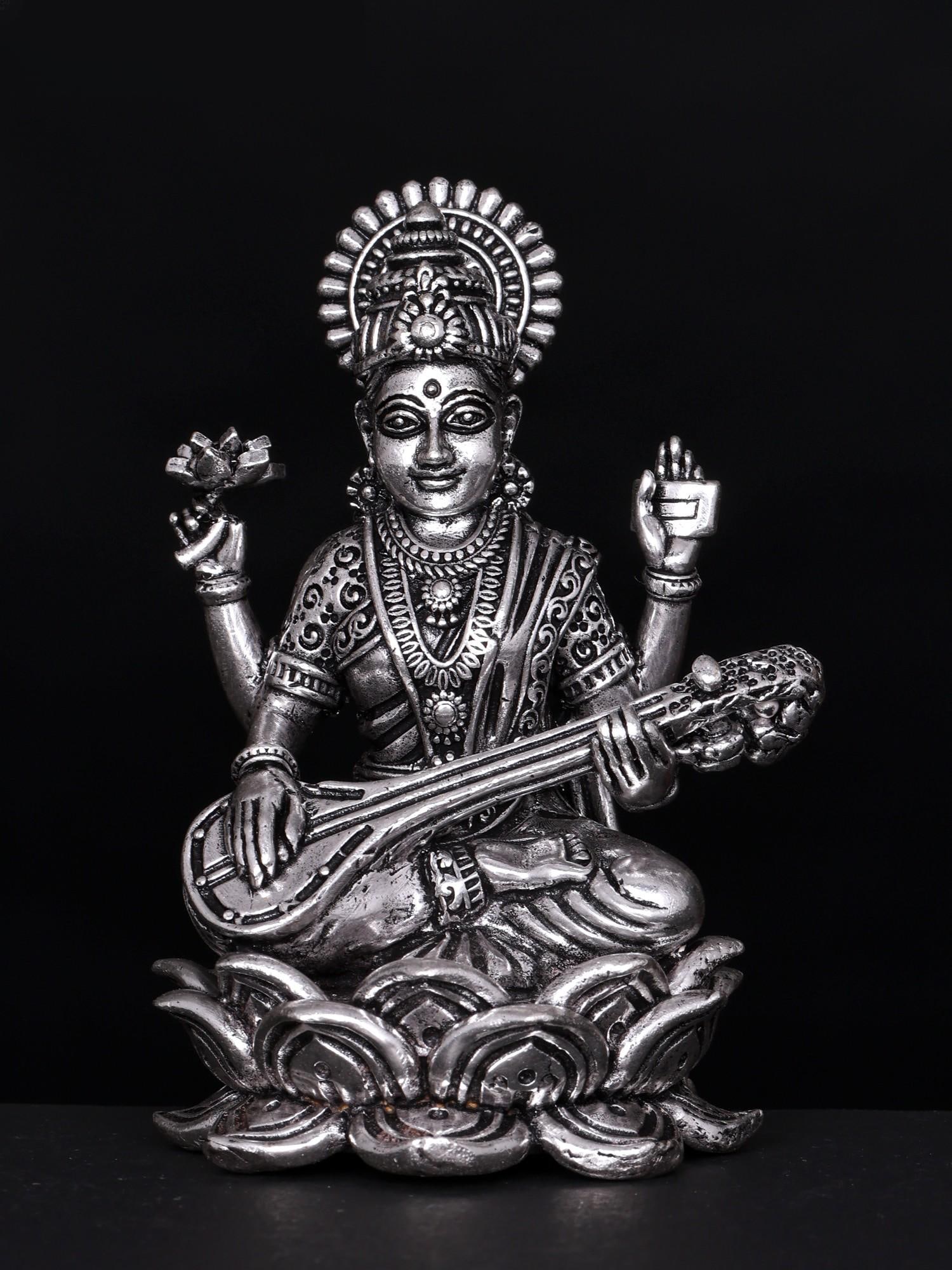 4" Small Superfine Goddess Saraswati Seated on Lotus | Silver Plated Brass Statue: Title: 4" Small Superfine Goddess Saraswati Seated on Lotus | Silver Plated Brass Statue Additional Information: itemcode: DDO143 Reserve: $103.00 Shipping: Domestic: Shipping rates are determined by 