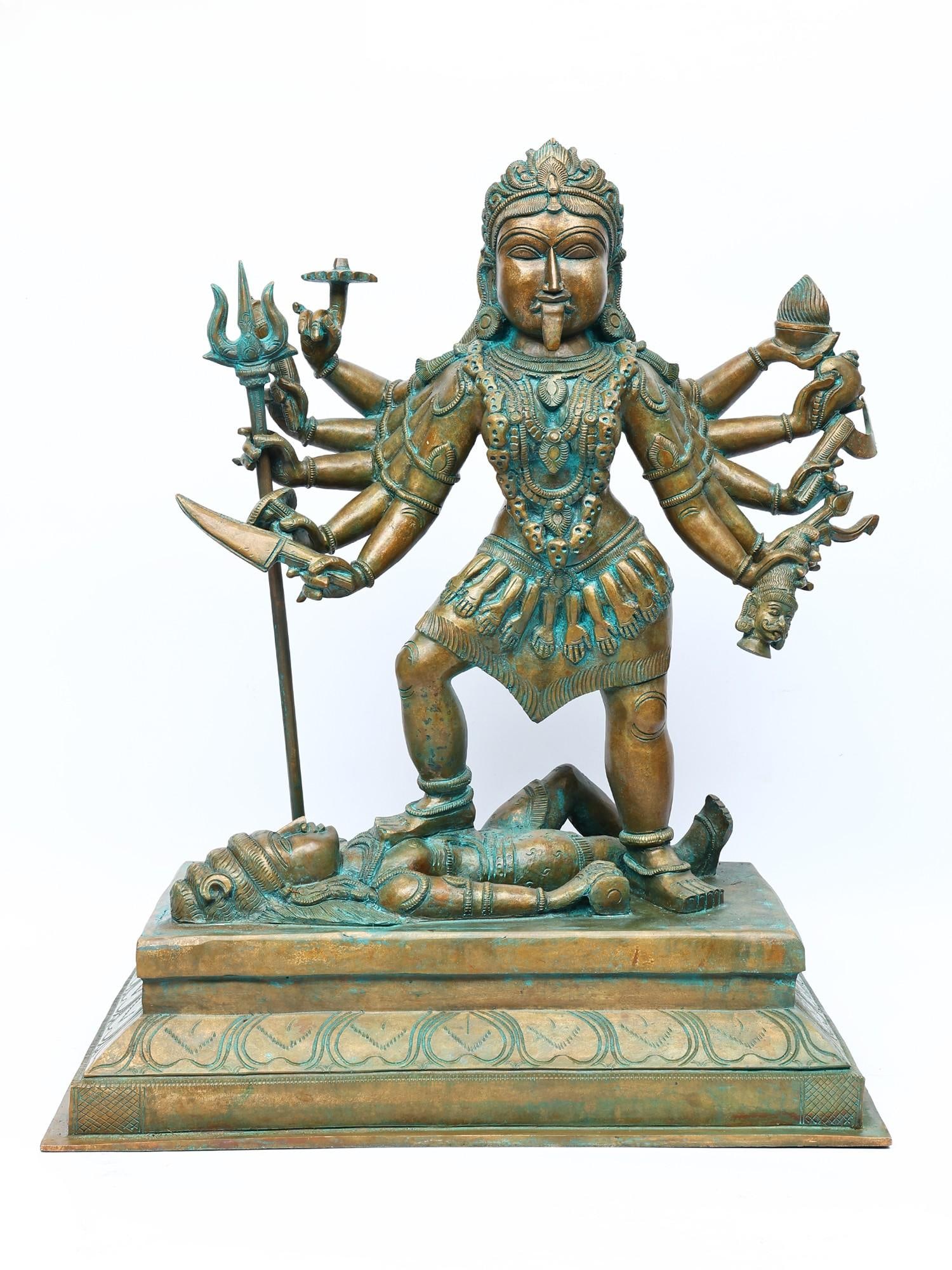25" Ten Armed Goddess Kali Standing on Lord Shiva | Bronze Statue: Title: 25" Ten Armed Goddess Kali Standing on Lord Shiva | Bronze Statue Additional Information: itemcode: DDN935 Reserve: $5,429.00 Shipping: Domestic: Shipping rates are determined by destination In