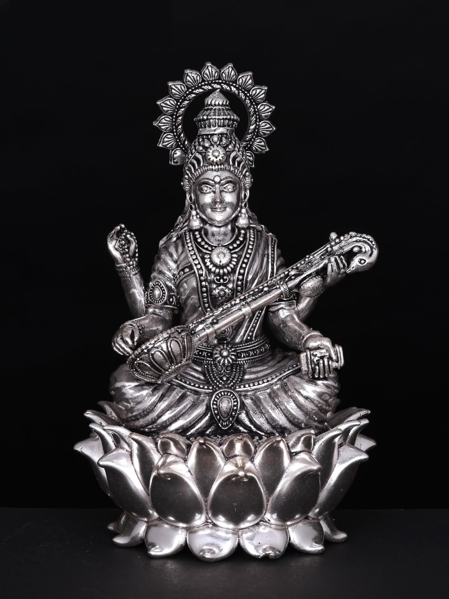 6" Small Superfine Devi Saraswati Seated on Lotus | Silver Plated Brass Statue: Title: 6" Small Superfine Devi Saraswati Seated on Lotus | Silver Plated Brass Statue Additional Information: itemcode: DDO154 Reserve: $197.00 Shipping: Domestic: Shipping rates are determined by des