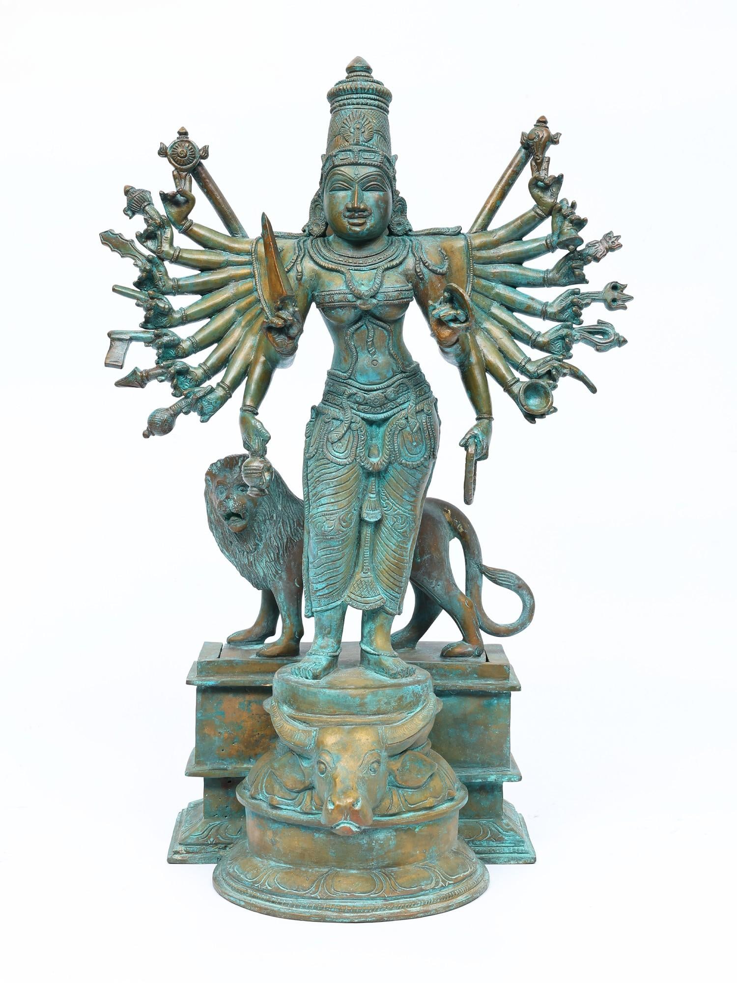 19" Eighteen Armed Standing Goddess Durga | Bronze Statue: Title: 19" Eighteen Armed Standing Goddess Durga | Bronze Statue Additional Information: itemcode: DDN983 Reserve: $1,651.00 Shipping: Domestic: Shipping rates are determined by destination Internatio