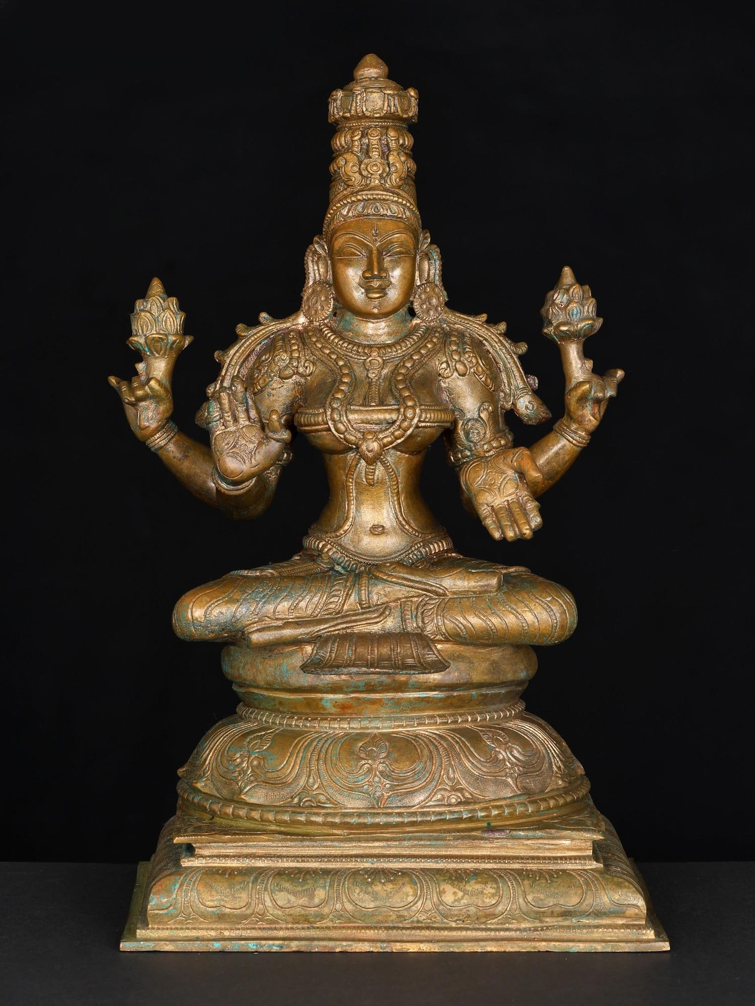 12" Sitting Goddess Lakshmi in Blessing Gesture | Bronze Statue: Title: 12" Sitting Goddess Lakshmi in Blessing Gesture | Bronze Statue Additional Information: itemcode: DDO003 Reserve: $926.00 Shipping: Domestic: Shipping rates are determined by destination Intern
