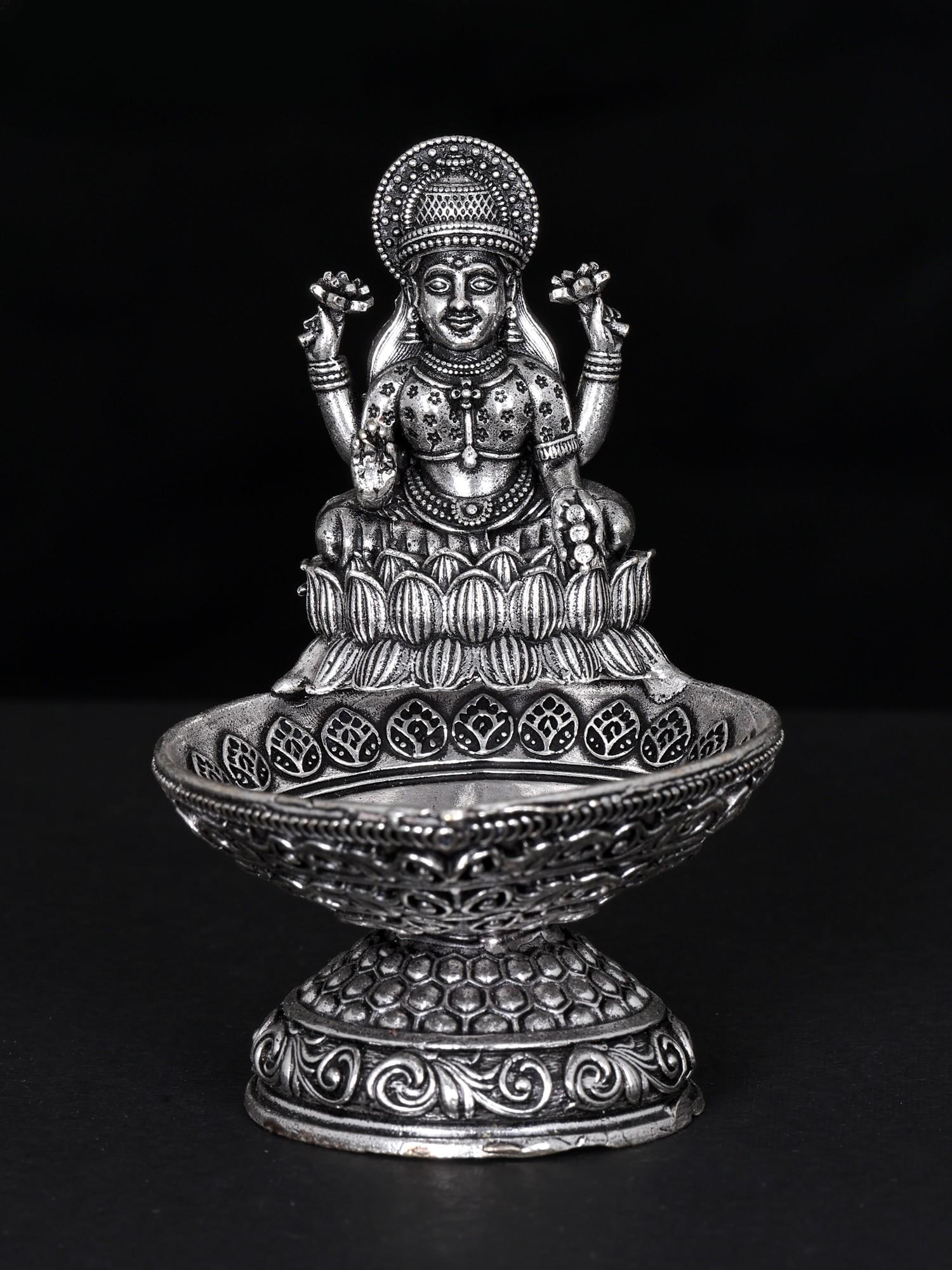 3" Small Superfine Brass Goddess Lakshmi Diya/Lamp: Title: 3" Small Superfine Brass Goddess Lakshmi Diya/Lamp Additional Information: itemcode: DDN623-Silver Reserve: $57.00 Shipping: Domestic: Shipping rates are determined by destination