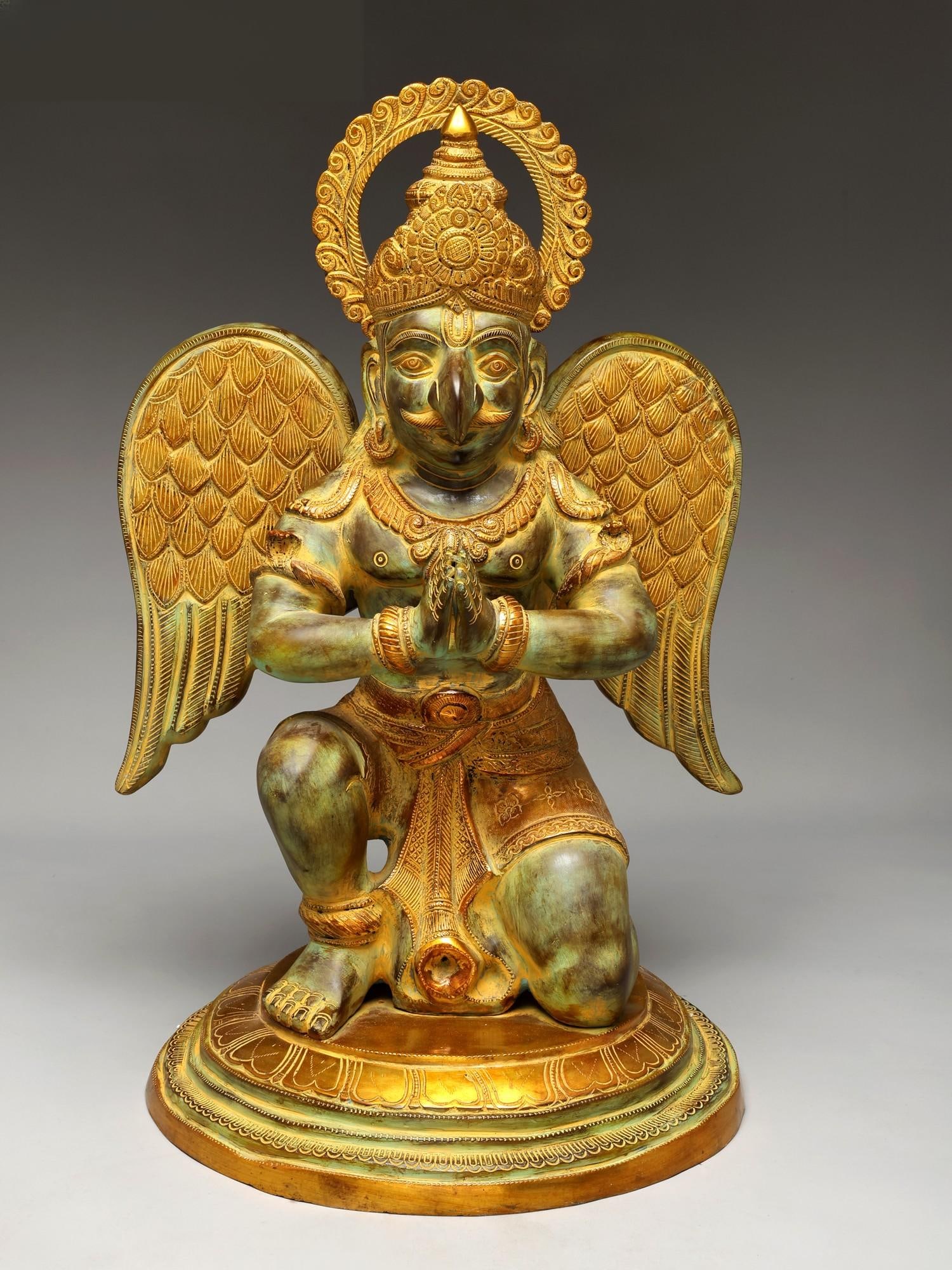 28" Sitting Garuda in Namaskar Mudra (Vahana of Lord Vishnu) | Brass Statue: Title: 28" Sitting Garuda in Namaskar Mudra (Vahana of Lord Vishnu) | Brass Statue Additional Information: itemcode: DDN752-Antique Chola Reserve: $2,603.00 Shipping: Domestic: Shipping rates are dete