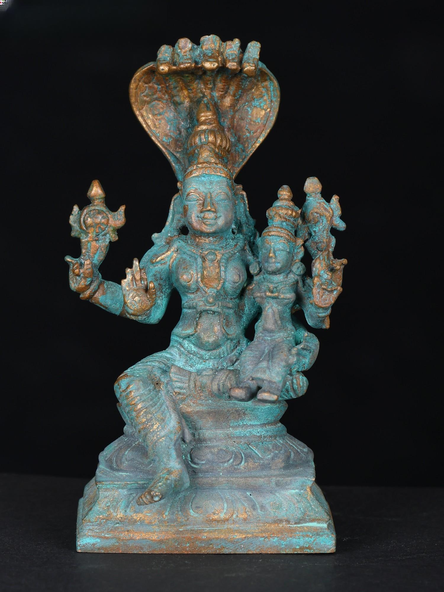 3" Small Sitting Vishnu - Lakshmi with Protecting Sheshnag | Bronze Statue: Title: 3" Small Sitting Vishnu - Lakshmi with Protecting Sheshnag | Bronze Statue Description: Sri Vishnu on the throne of Sheshanaga with goddess Lakshmi by his side is the perfect vision of cosmic b