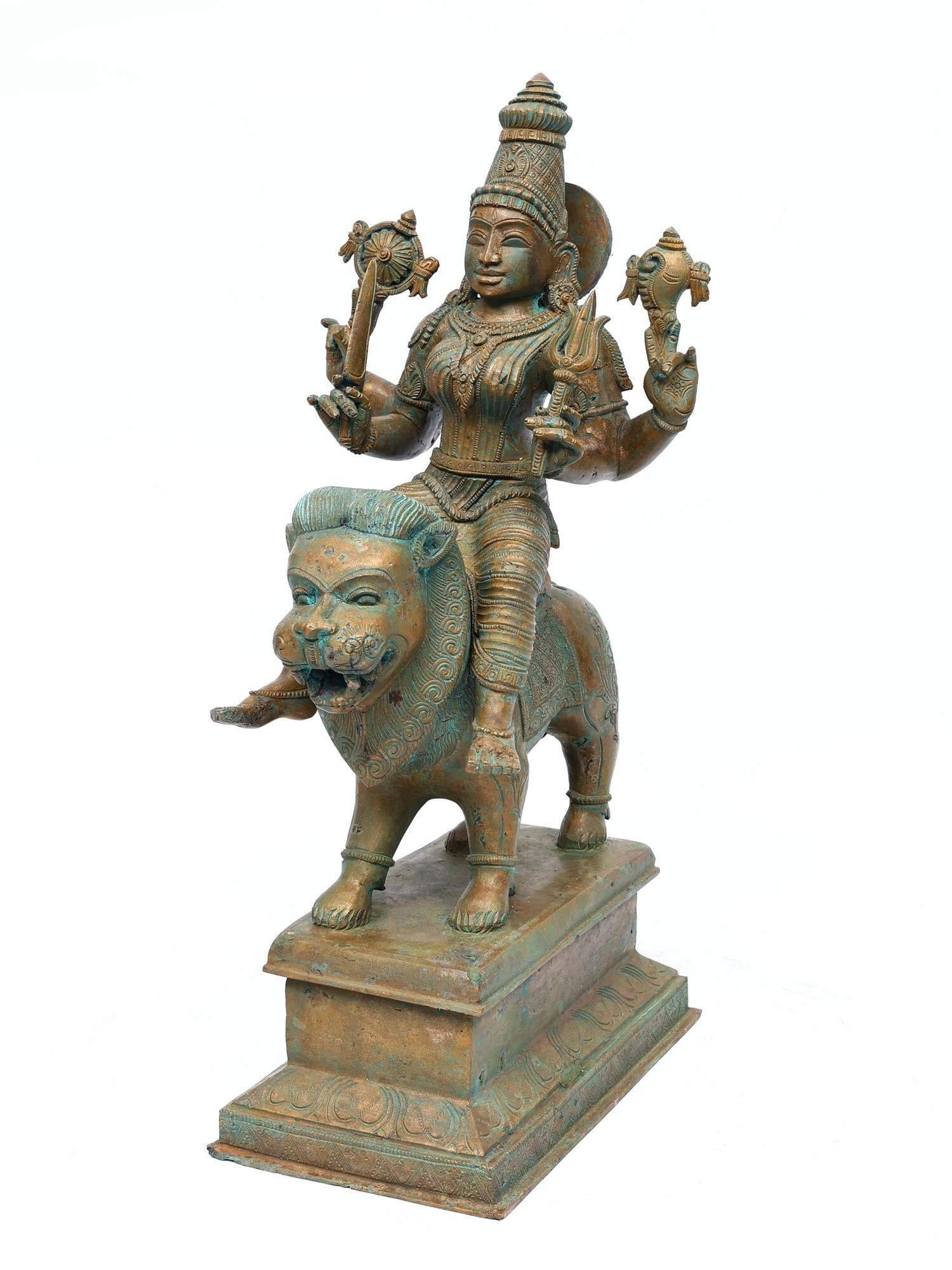 17" Four Armed Goddess Durga Seated on Lion | Bronze Statue: Title: 17" Four Armed Goddess Durga Seated on Lion | Bronze Statue Additional Information: itemcode: DDN938 Reserve: $1,237.00 Shipping: Domestic: Shipping rates are determined by destination Internat