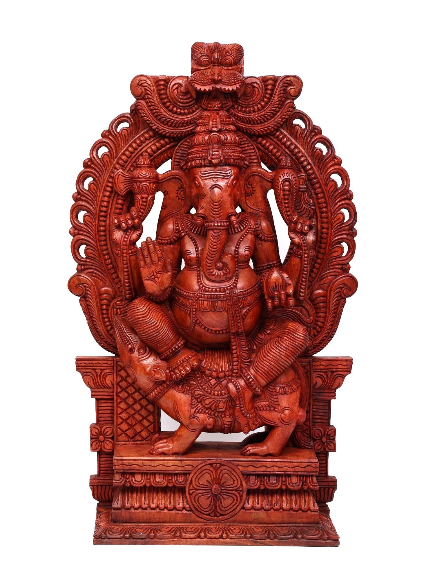 50" Large Blessing Lord Ganesha Seated on Mushak with Kirtimukha Prabhavali | Wood Carving: Title: 50" Large Blessing Lord Ganesha Seated on Mushak with Kirtimukha Prabhavali | Wood Carving Additional Information: itemcode: DDO595 Reserve: $1,961.00 Shipping: Domestic: Shipping rates are det