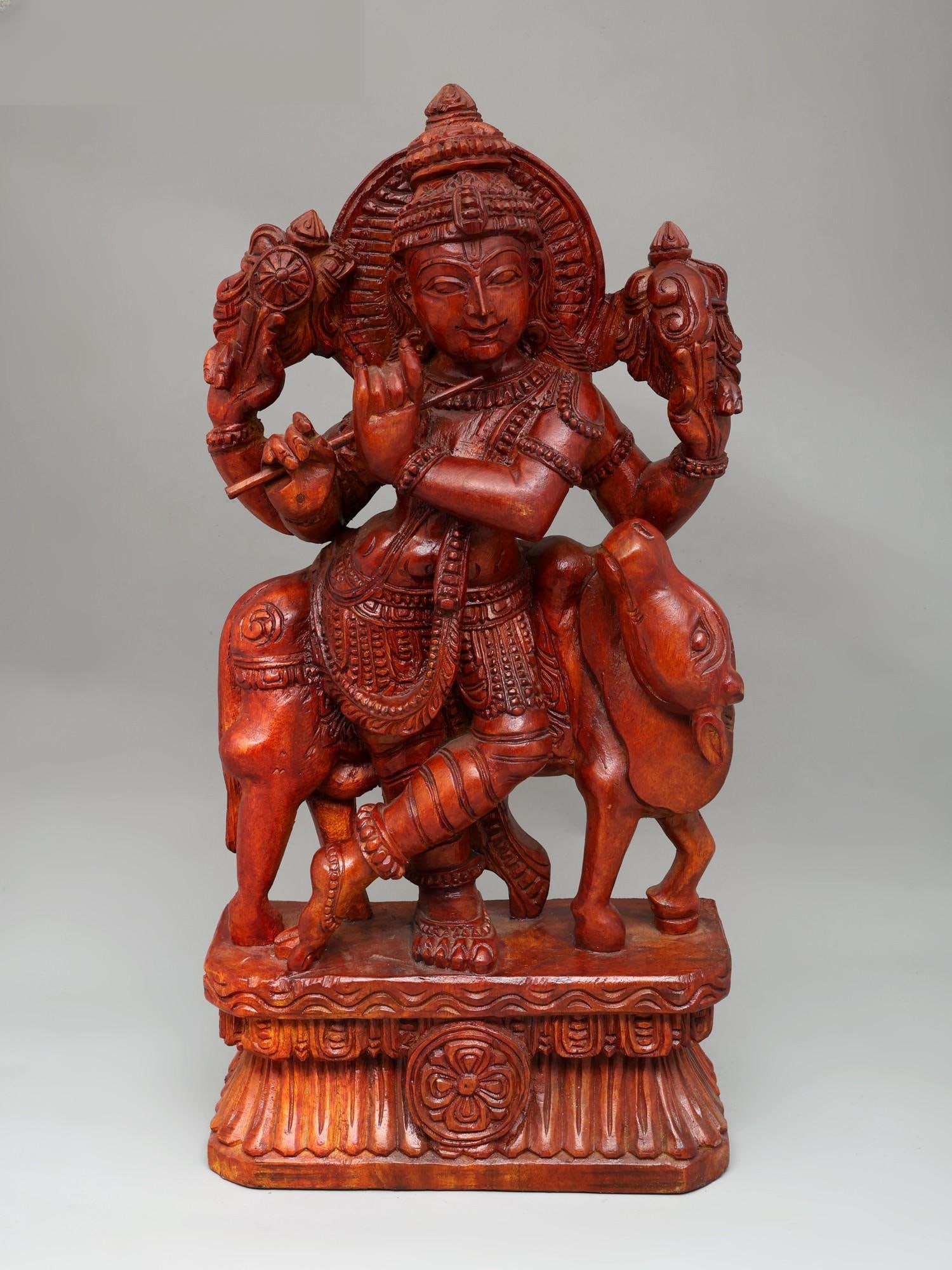 24" Lord Krishna Playing Flute with Cow | Wood Carving: Title: 24" Lord Krishna Playing Flute with Cow | Wood Carving Additional Information: itemcode: DDO670 Reserve: $388.00 Shipping: Domestic: Shipping rates are determined by destination International: