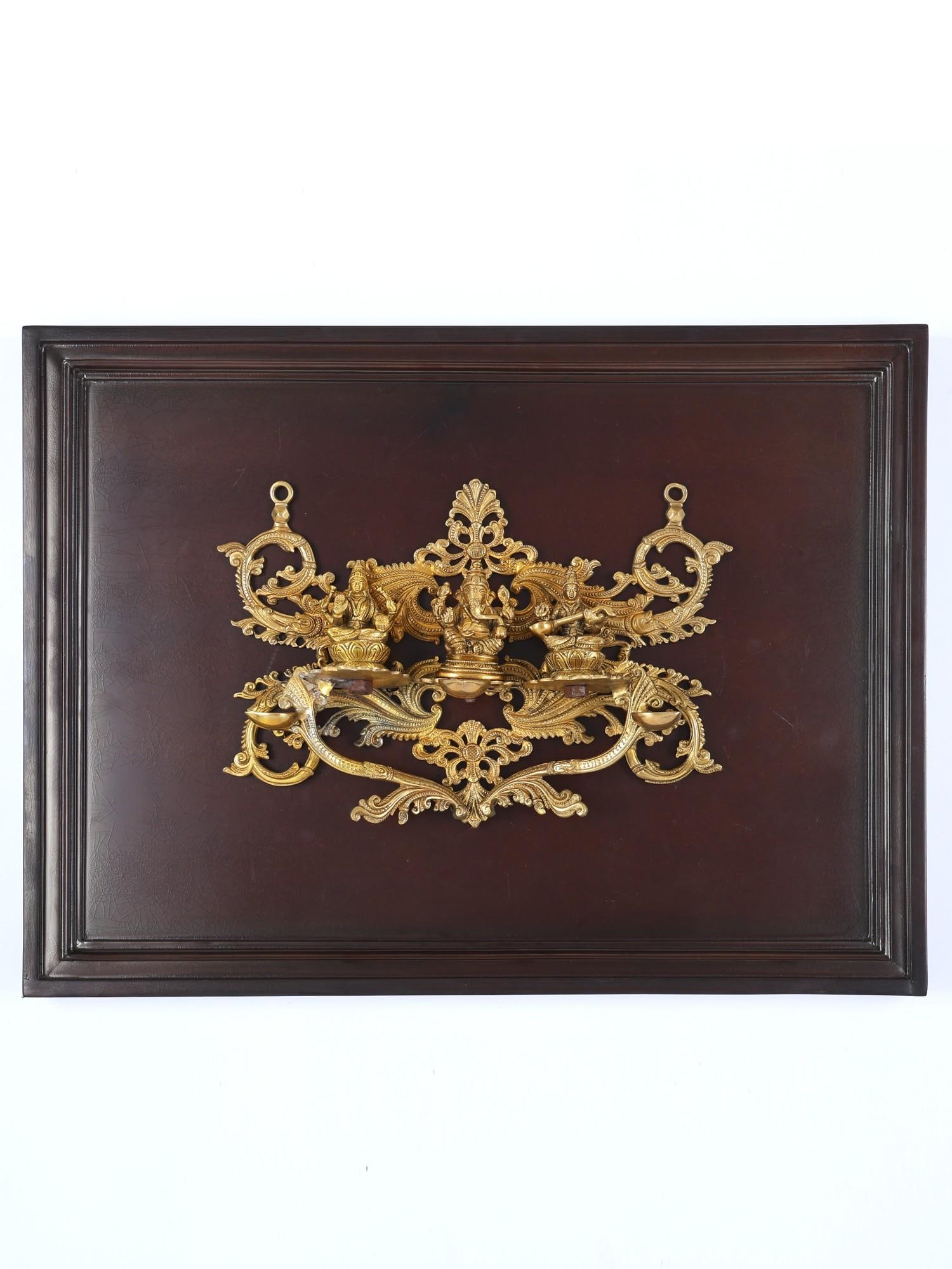 24" Lakshmi Ganesha Saraswati with Diya | Wood Framed Brass Sculpture | Wall Hanging: Title: 24" Lakshmi Ganesha Saraswati with Diya | Wood Framed Brass Sculpture | Wall Hanging Additional Information: itemcode: DDN682 Reserve: $429.00 Shipping: Domestic: Shipping rates are determined