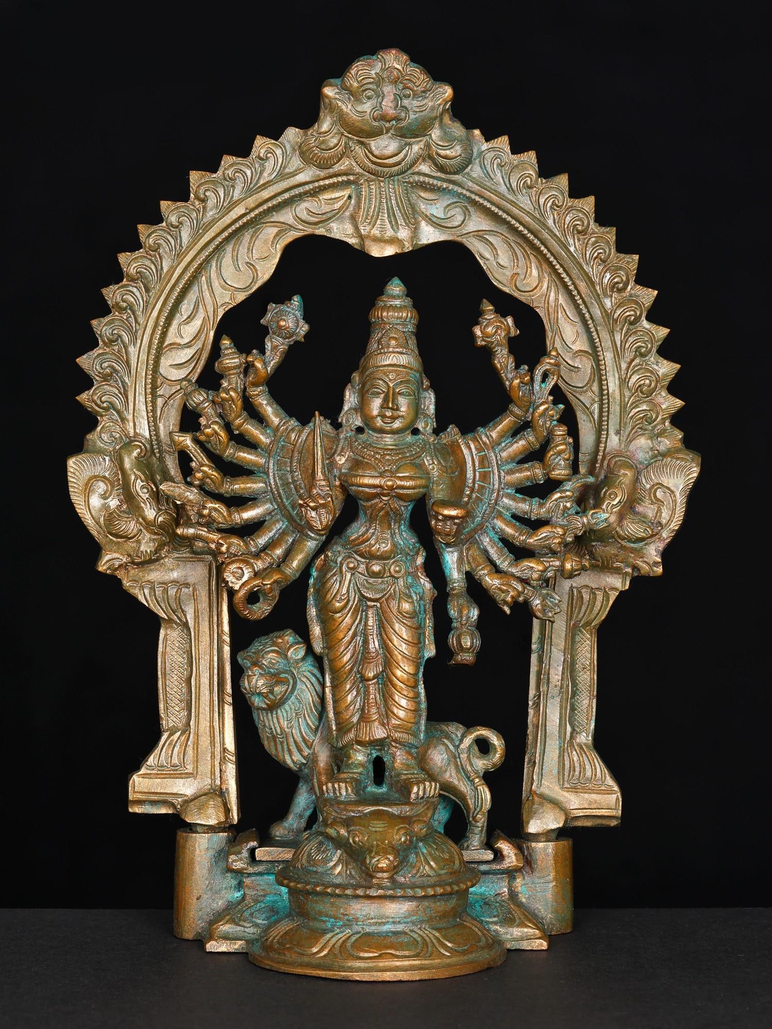 9" Eighteen Armed Standing Goddess Durga with Kirtimukha Prabhavali | Bronze Statue: Title: 9" Eighteen Armed Standing Goddess Durga with Kirtimukha Prabhavali | Bronze Statue Additional Information: itemcode: DDN997 Reserve: $491.00 Shipping: Domestic: Shipping rates are determined b