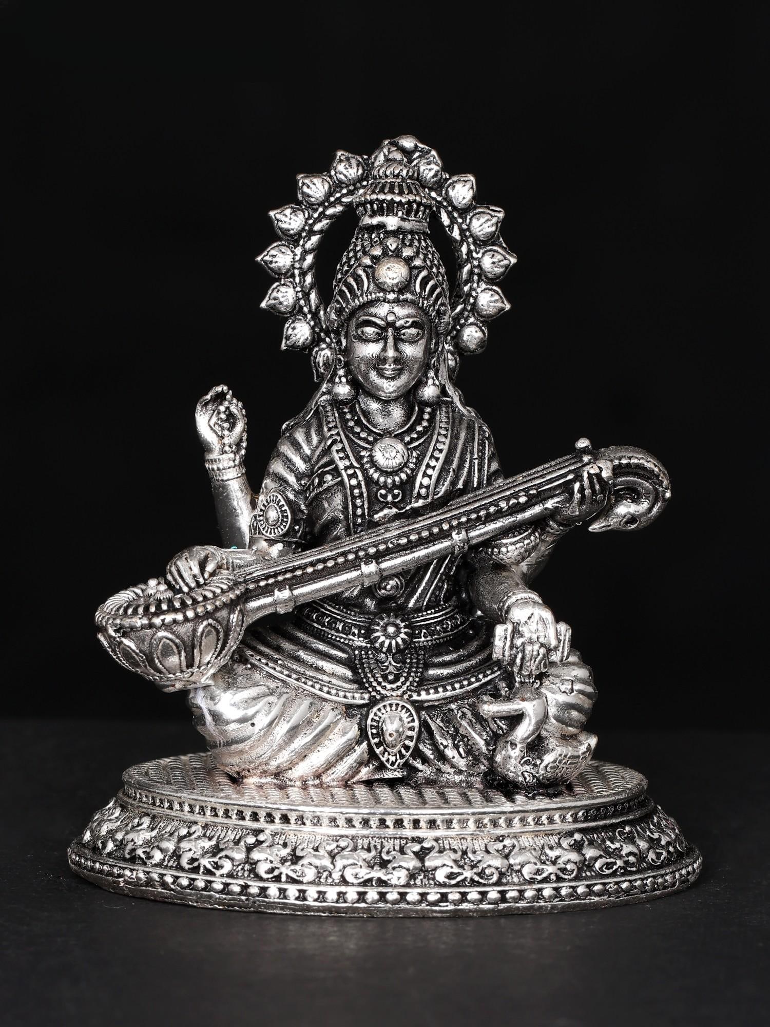 2" Small Superfine Devi Saraswati Playing Veena | Silver Plated Brass Statue: Title: 2" Small Superfine Devi Saraswati Playing Veena | Silver Plated Brass Statue Additional Information: itemcode: DDO162 Reserve: $47.00 Shipping: Domestic: Shipping rates are determined by
