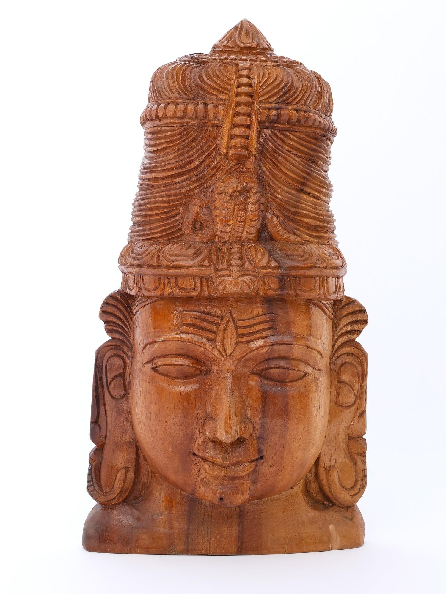 18" Lord Shiva Head | Wall Hanging | Wood Carving: Title: 18" Lord Shiva Head | Wall Hanging | Wood Carving Description: Artist : Sagai Raj, State Award Winner Additional Information: itemcode: DDO576 Reserve: $264.00 Shipping: Domestic: Shipping