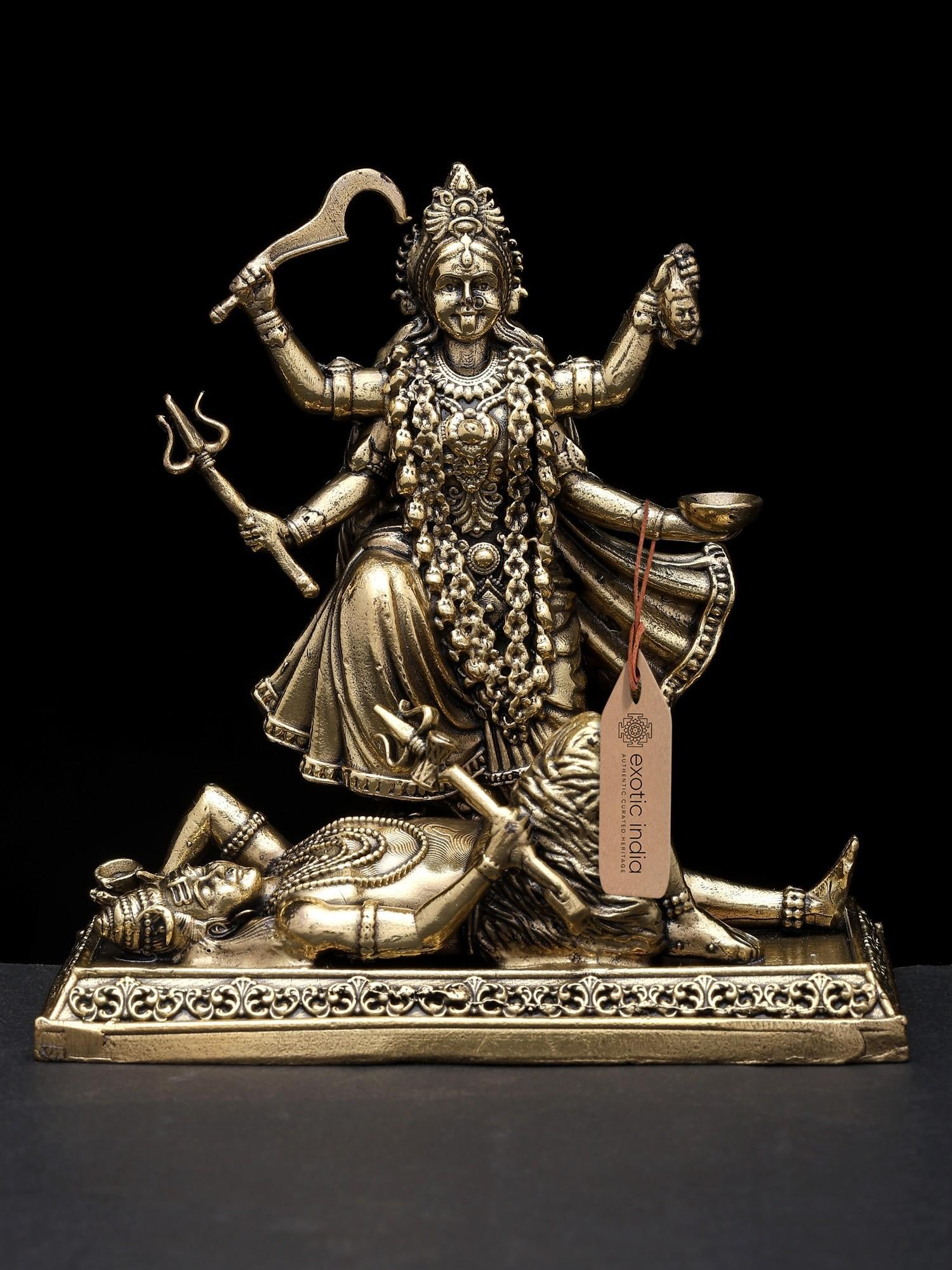 4" Small Superfine Goddess Kali Standing on Lord Shiva | Brass Statue: Title: 4" Small Superfine Goddess Kali Standing on Lord Shiva | Brass Statue Additional Information: itemcode: DDO312 Reserve: $77.00 Shipping: Domestic: Shipping rates are determined by destination