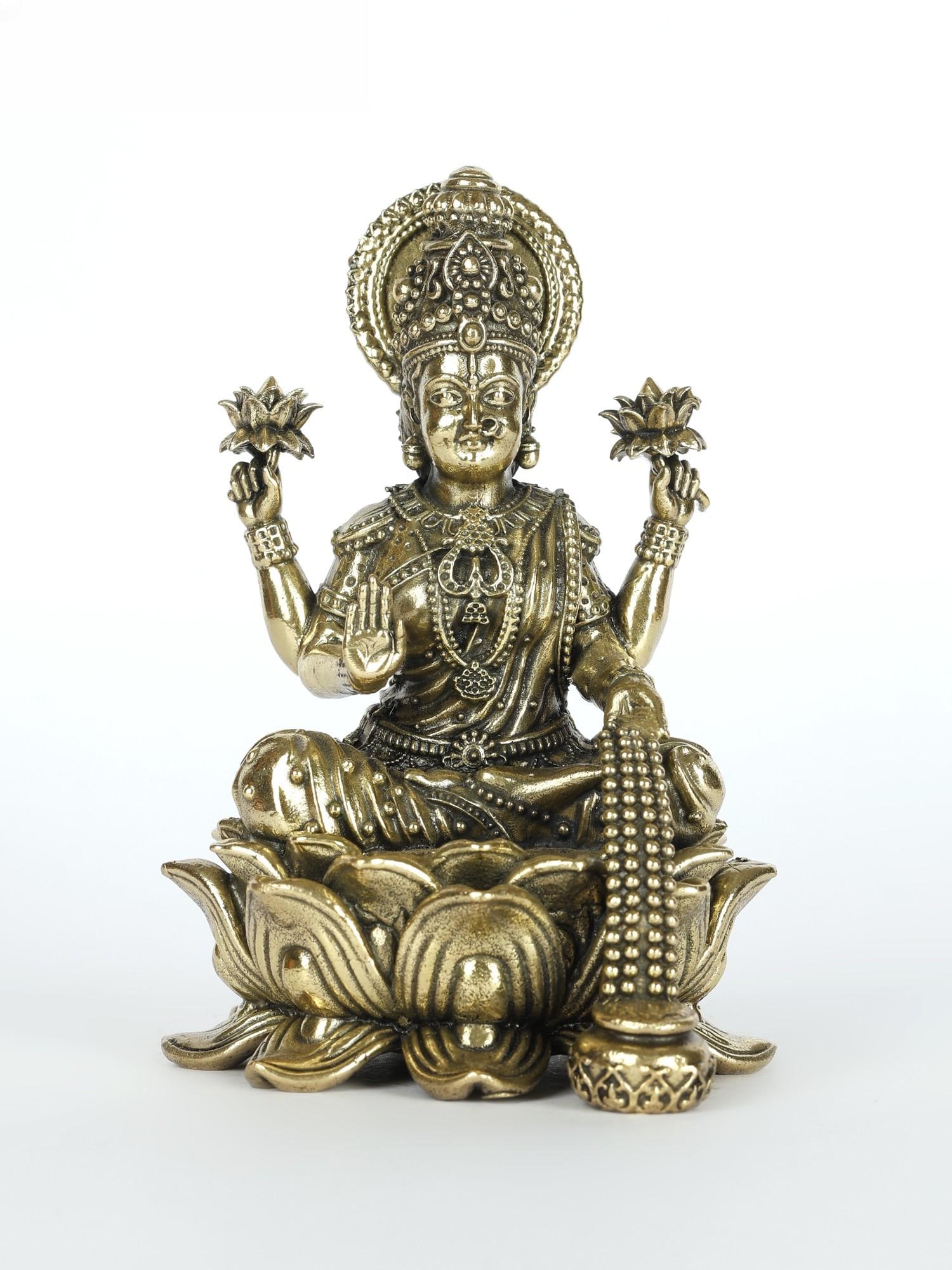 Small Superfine Blessing Goddess Lakshmi Seated on Lotus /Spiritual Brass Statue for Home Temple: Description: From the Vedic times, two things associated with Lakshmi are the lotus (Kamala)- her home and throne and the luster of gold, that radiates from her endlessly. The superfine brass icon