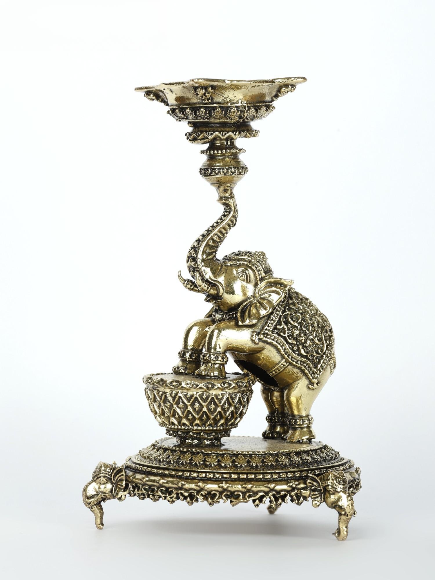 6" Superfine Designer Elephant Lamp in Brass: Description: The designer superfine lamp is a vision of what the brass artists can do, it's every element delicately etched as if with a hair-thin nail. The miniature piece depicts an elephant