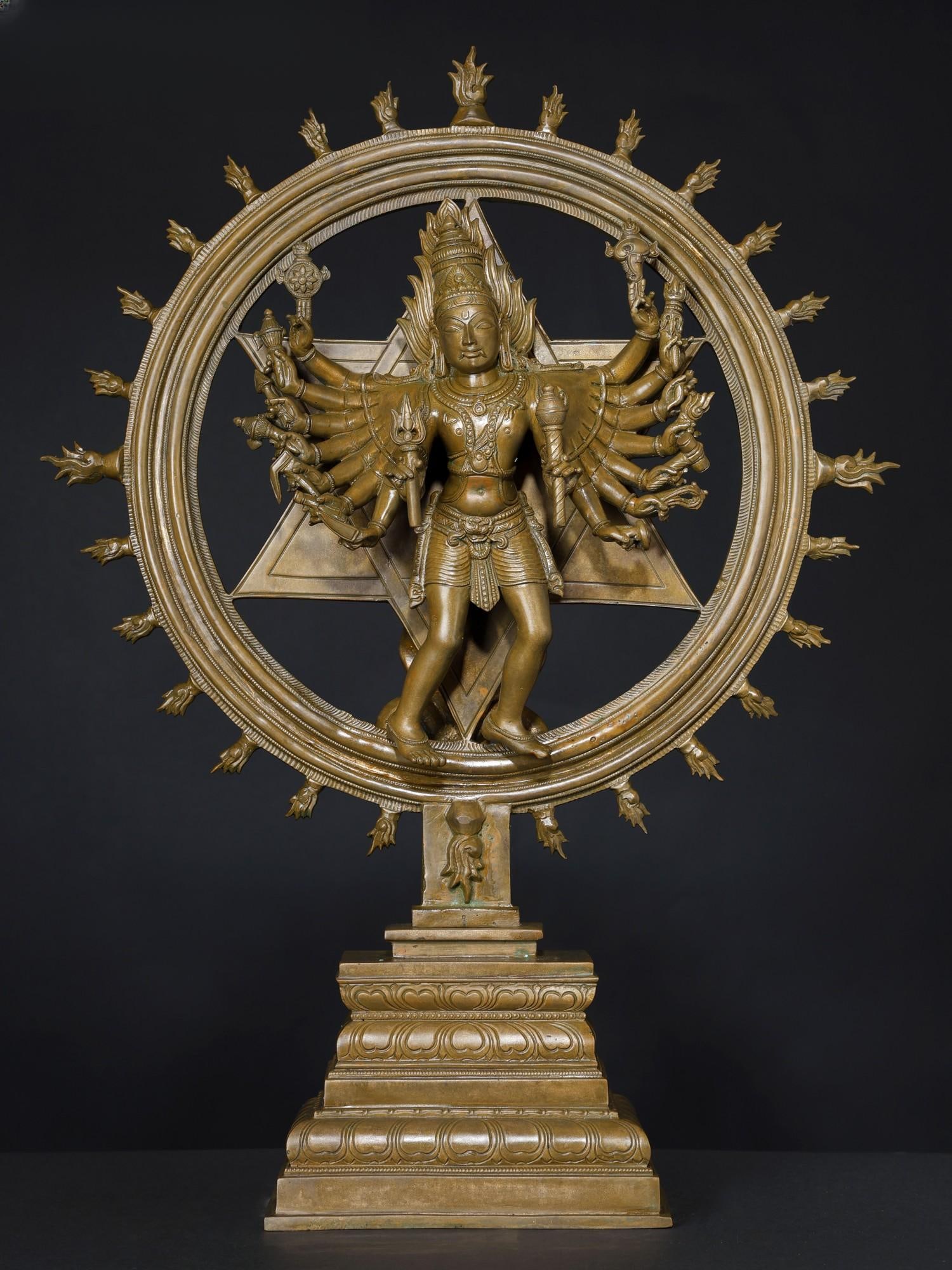 21" Superfine Chakrathalwar (Sudarshan Vishnu with Yoga Narasimha on Reverse) Bronze Statue: Description: Sudarshana Perumal, or Chakrathalwar, the divine discus of Sri Vishnu is a sacred element in the Ayudha Puja (worship of weapons) in Vaishnava shrines of South India. In the Ahirbudhanya 