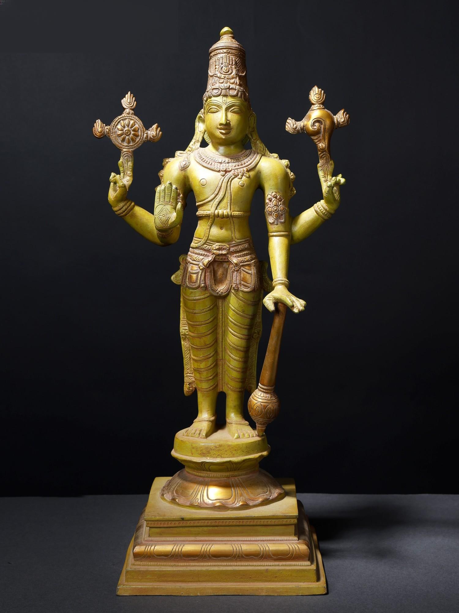 19" Four-Armed Blessing Lord Vishnu Brass Statue /Hindu God Figurine: Description: Vishnu, the preserver of the universe, in this depiction, Vishnu is shown standing or sitting in a composed, regal posture, excluding a sense of divine authority and tranquility. Each of