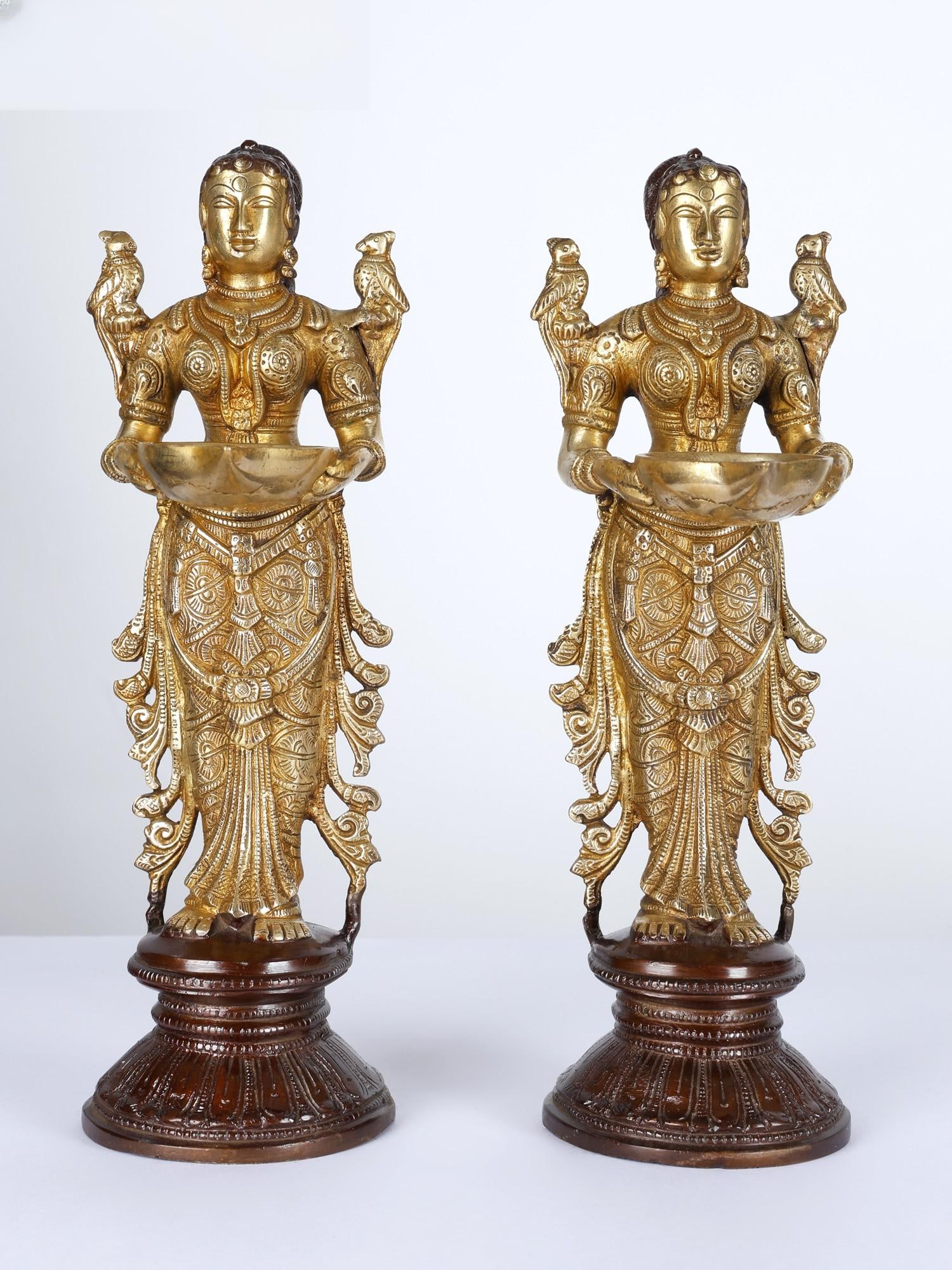 12" Pair of Deep Lakshmi Statues in Brass: Description: --- Additional Information: itemcode: DDM327 Reserve: $305.00 Shipping: Domestic: Shipping rates are determined by destination International: Foreign shipping rates are determined by