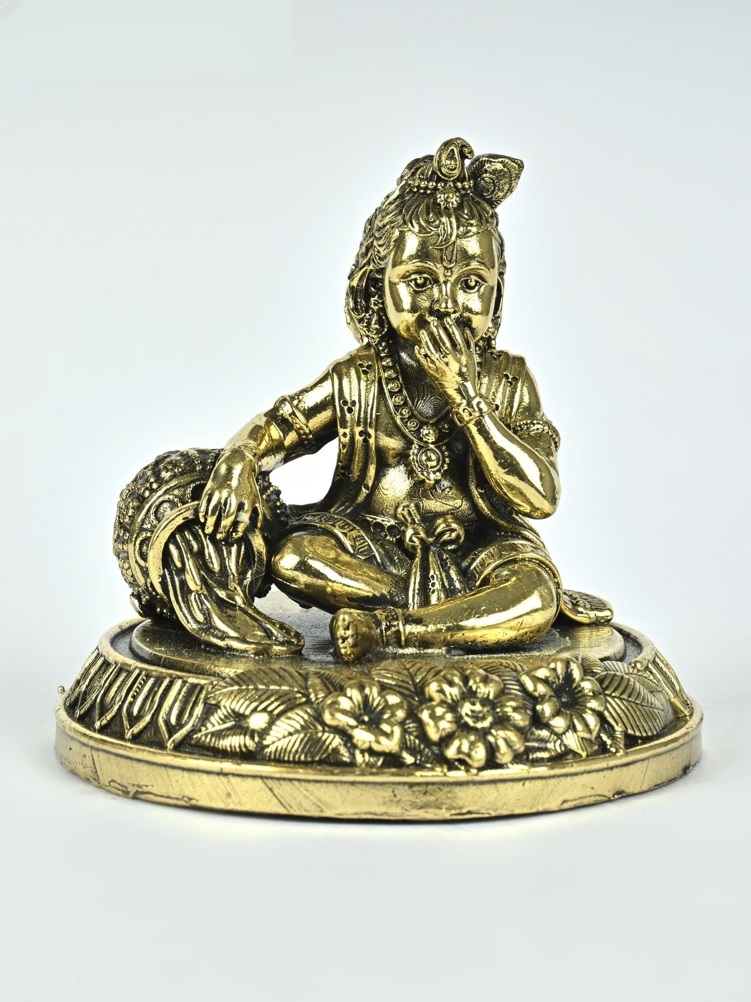 3" Small Superfine Butter Krishna Brass Statue: Description: As if chuckling softly at his own mischievousness, Makhan-Chor Krishna animates this statue, with the sweetest smile in three realms. Artistic finesse shines throughout the superfine