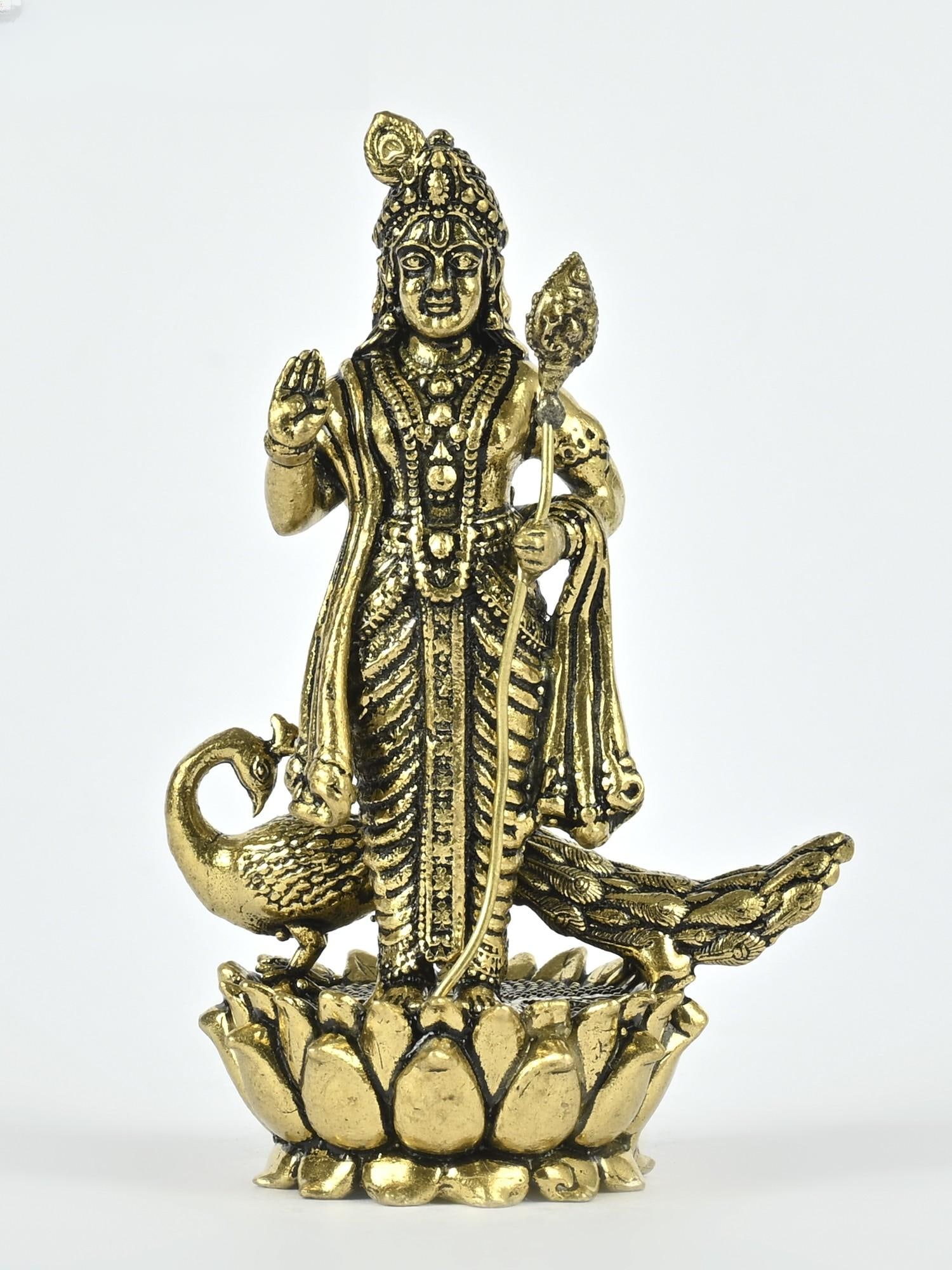 2" Small Lord Karttikeya Brass Statue Standing on Lotus with Peacock: Description: The exquisite statue is a testament to the artist's talent and dedication. Its flawless lines, shaping, and polish combine to produce a celestial portrayal of Kumara, the youthful deity