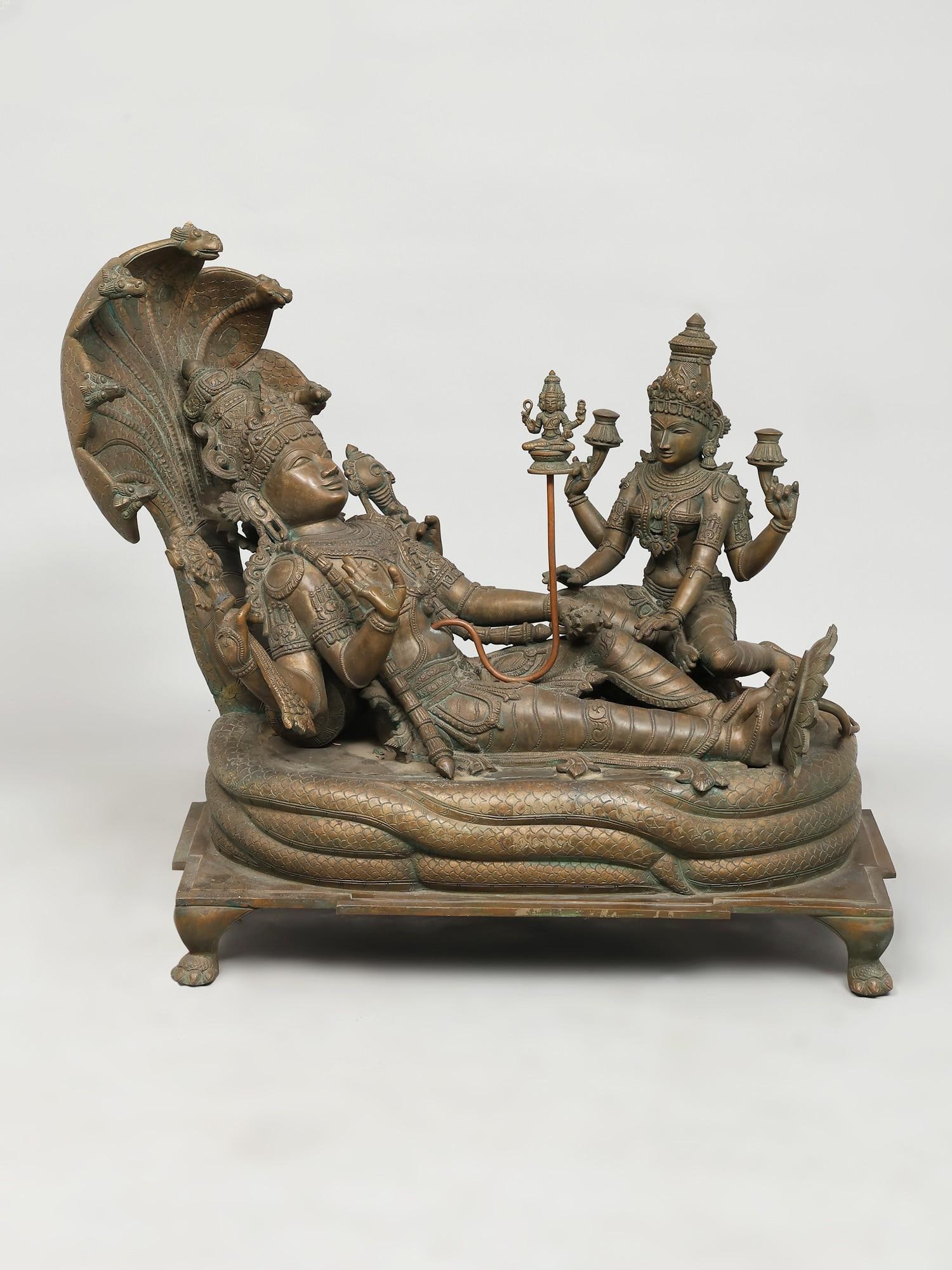 30" Padmanabha Swamy (Shesha-Shayi Vishnu) /Madhuchista Vidhana (Lost-Wax) /Panchaloha Bronze from: Description: "Serene, lying on serpent bed, with a lotus emerging from his navel, the Lord of Gods. The foundation of the Universe, with a body like the dark rainy clouds. The beloved of Lakshmi, lotu