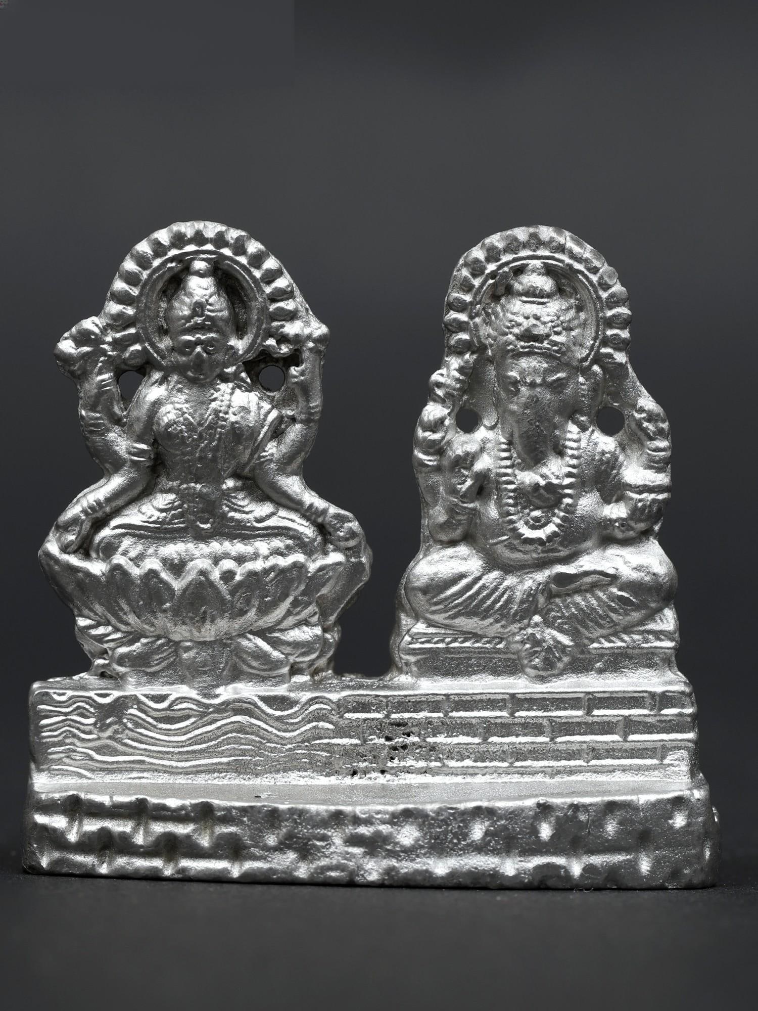 1" Small Pair of Lakshmi-Ganesha Statue /Made of Mercury: Description: --- Additional Information: itemcode: DDM940 Reserve: $32.00 Shipping: Domestic: Shipping rates are determined by destination International: Foreign shipping rates are determined by