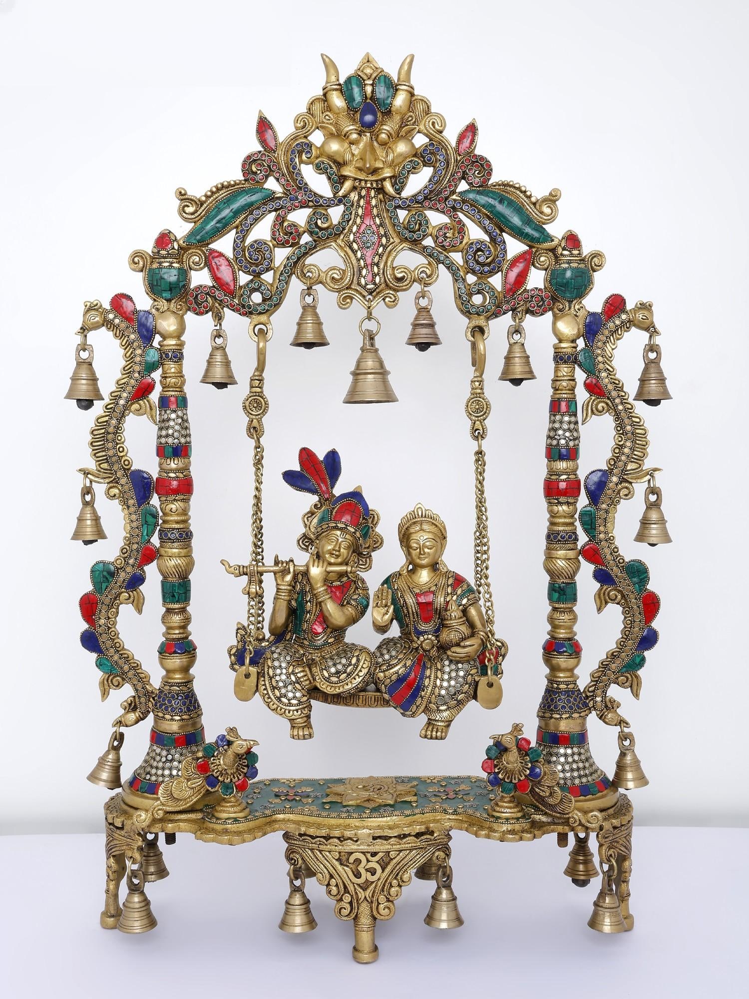 29" Pair of Radha-Krishna on Kirtimukha Swing with Bells /Brass with Inlay Work: Description: --- Additional Information: itemcode: DDN066 Reserve: $1,185.00 Shipping: Domestic: Shipping rates are determined by destination International: Foreign shipping rates are determined by de