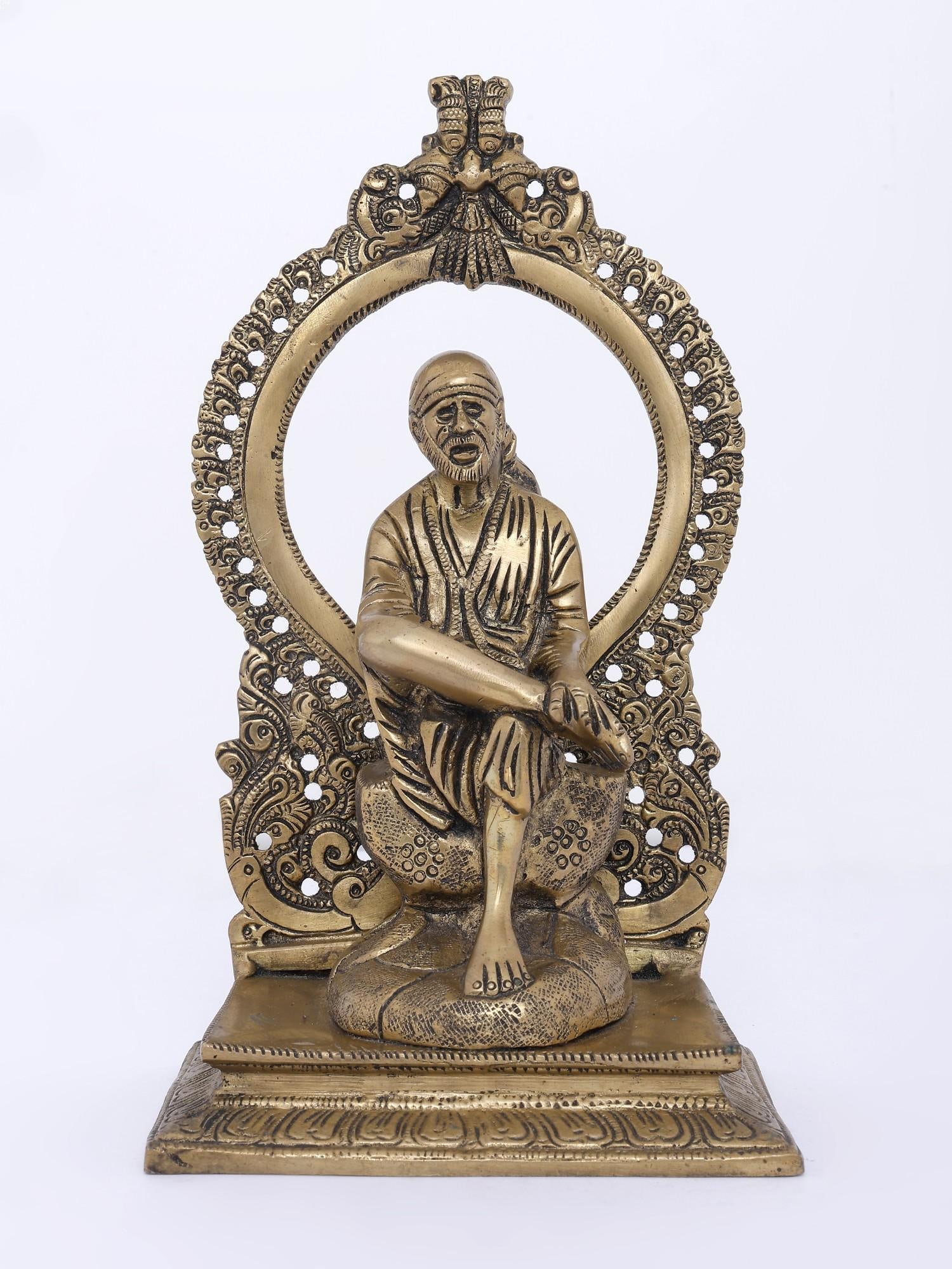 8" Sai Baba Seated on Kirtimukha Throne /Brass Statue: Description: --- Additional Information: itemcode: DDN074 Reserve: $160.00 Shipping: Domestic: Shipping rates are determined by destination International: Foreign shipping rates are determined by