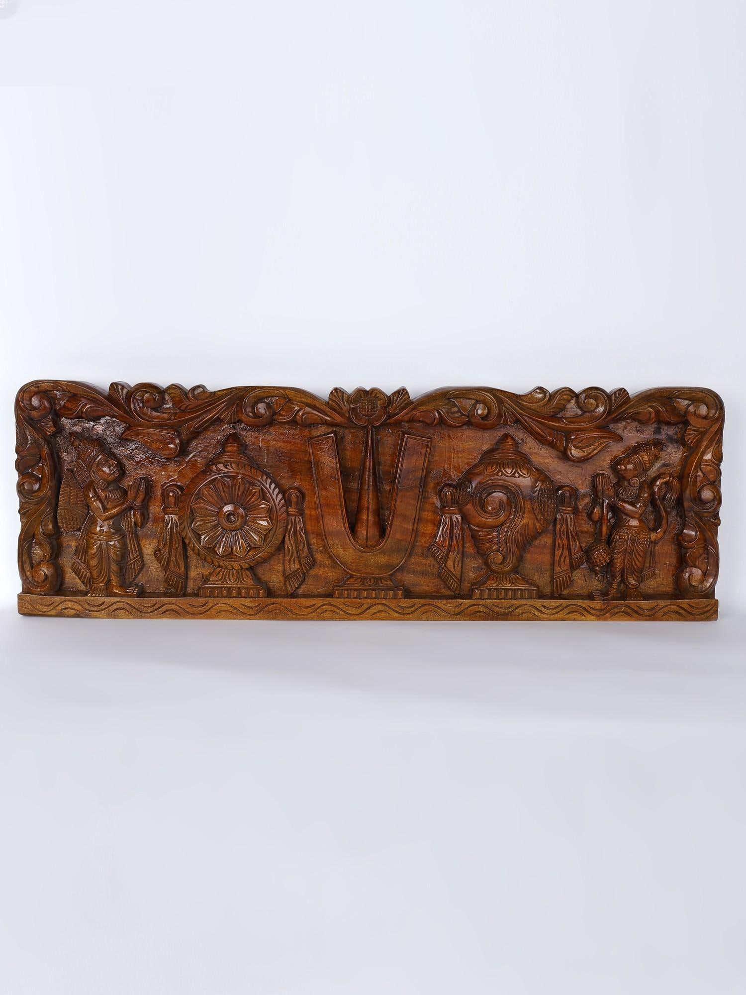 36" Large Vaishnava Symbols (Shankha, Chakra and Tilak) with Garuda and Hanuman /Wood Carved Panel: Description: Symbols of Hindu gods and goddesses in your home represent their protective aura, telling the negativity of the world that you are under their guarding gaze. This wooden wall panel brings