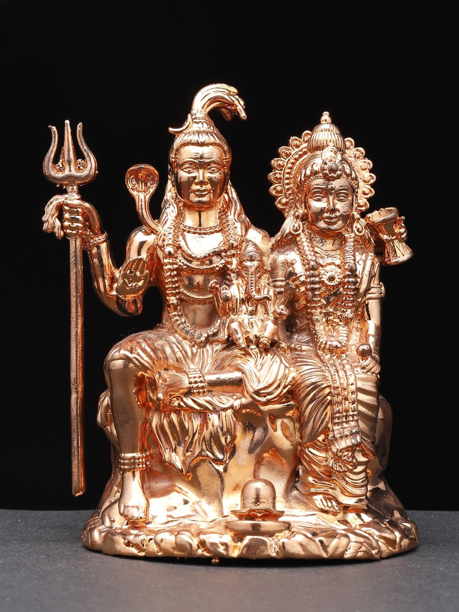 4" Small Shiva Family Brass Statue /Religious Home Figurine: Description: A fine rose-gold polish adorns the icon of Shiva Parivaar, a perfect idol for your place of worship, a symbol of universal bliss. Shiva is ornamented with Ganga, Rudraksha jewelry, tiger