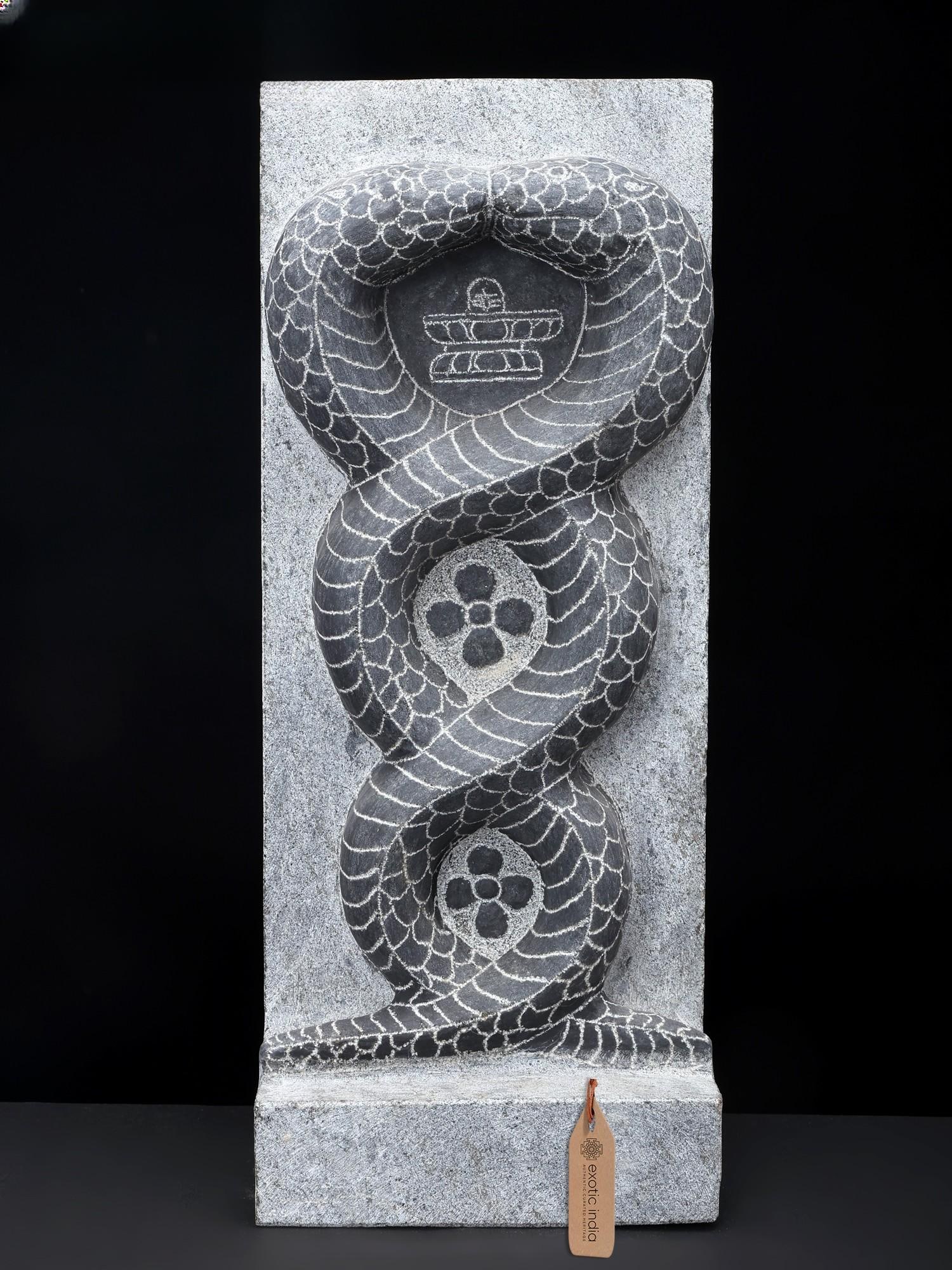 15" Two Snakes with Shiva Linga /Hand Carved Granite Stone Statue: Description: "Pinal-Nagam"- the stone carved sculptures of intertwining Naga or serpents are a common sacred iconography of temples in Southern India. Rising above, the serpents are symbols of