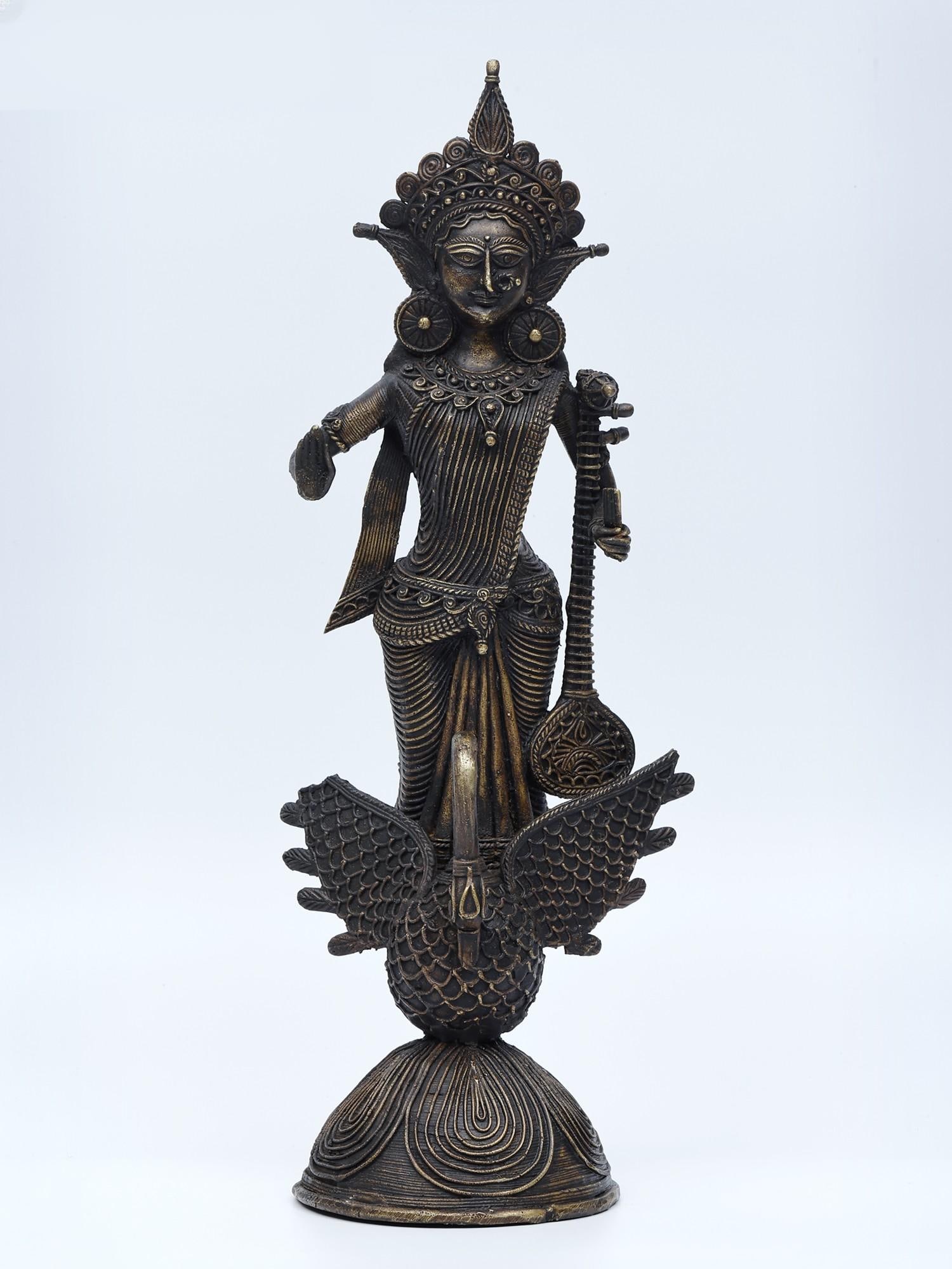 14" Goddess Saraswati Standing on Swan /Tribal Brass Statue: Description: --- Additional Information: itemcode: DDN346 Reserve: $409.00 Shipping: Domestic: Shipping rates are determined by destination International: Foreign shipping rates are determined by