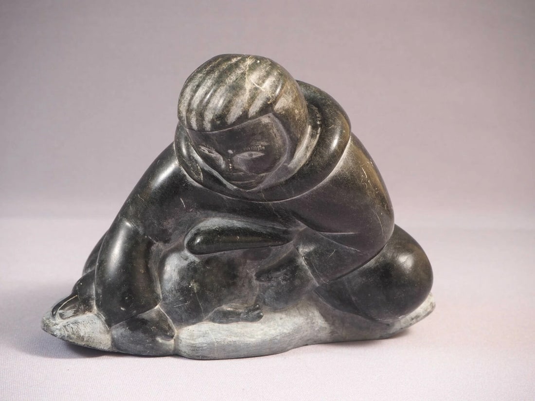 Inuit Canada Native Seal Man Qoomaluk Qumaluk Original label SIGNED: This is a vintage Native American Eskimo Inuit Figurine. The carvings come with its original label. It is signed Qoomaluk. It is possible to be made by Levi Qumaluk but I am not sure It is made in Pov