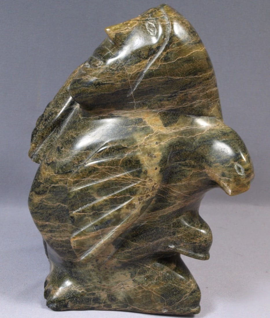 Inuit Native American Soapstone Man Seal bird Totem Animal Canada VINTAGE: This is a vintage Primitive Native American Eskimo Inuit Figurine. The figurine is made from soapstone and is very beautiful. The figurine shows a native man with a bird and a seal on the side. The ca