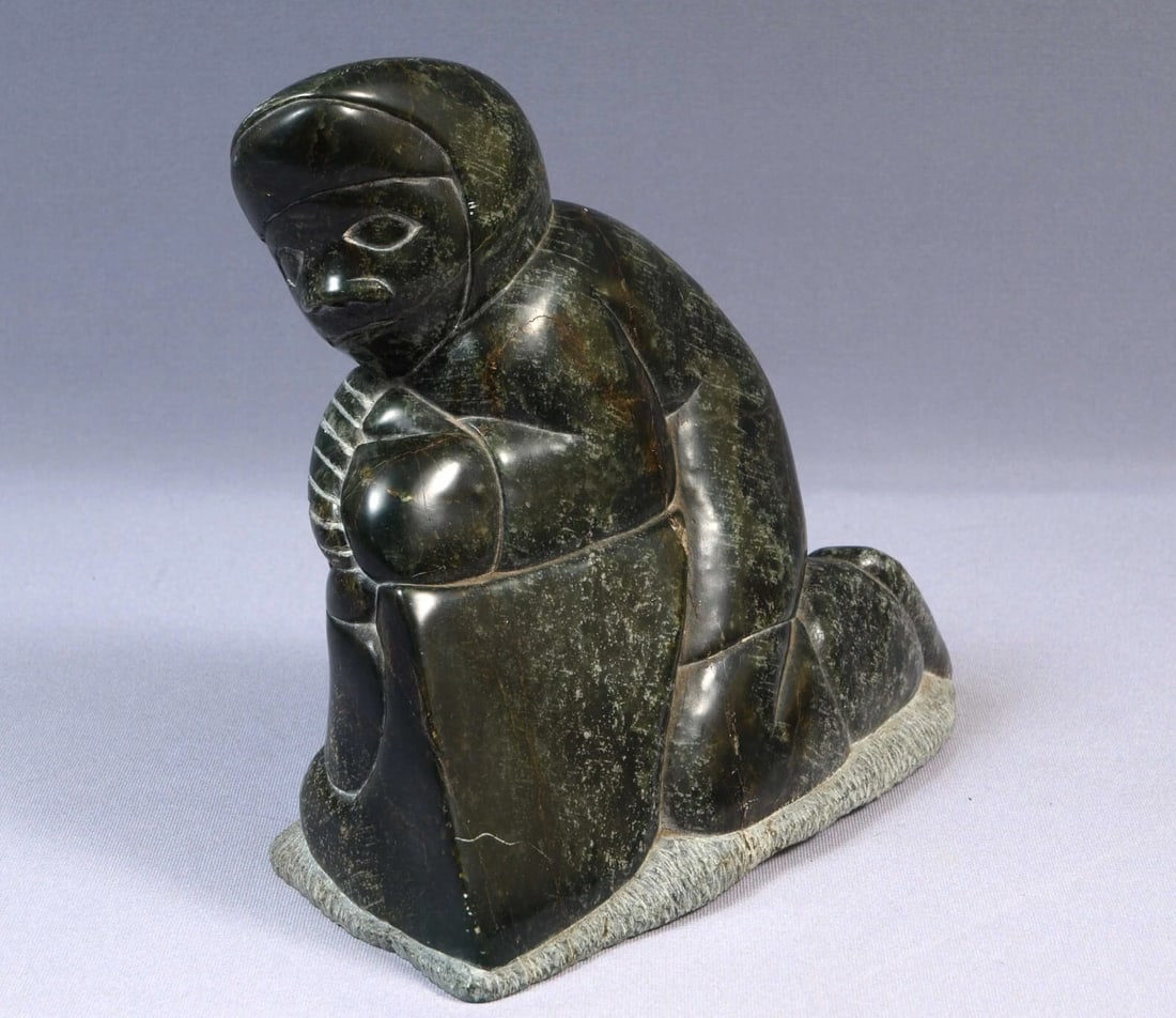 Inuit Eskimo 1980 Native American Soapstone Kneeling Man 9lb Canada: This is a vintage Primitive Native American Eskimo Figurine. The figurine is made from stone and it is very beautiful. It shows a kneeling man in a traditional outfit . It is signed at the bottom with