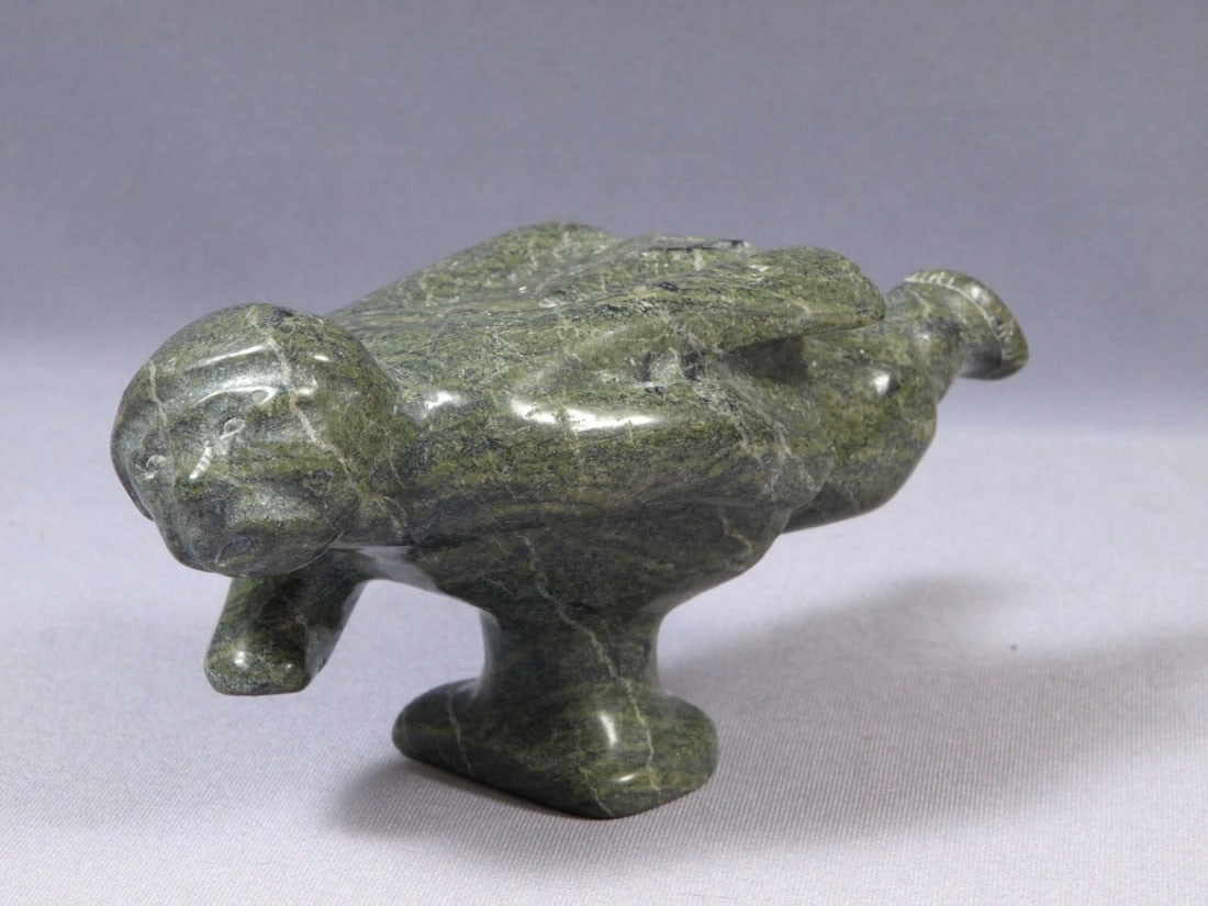 Inuit Eskimo Native American Soapstone Carving Flying Man RHODA PETERLOOSIE: This is a vintage Primitive Native American Eskimo Figurine. The figurine is made from stone and it is very beautiful. It shows a flying man in a traditional outfit. It is signed at the bottom. The