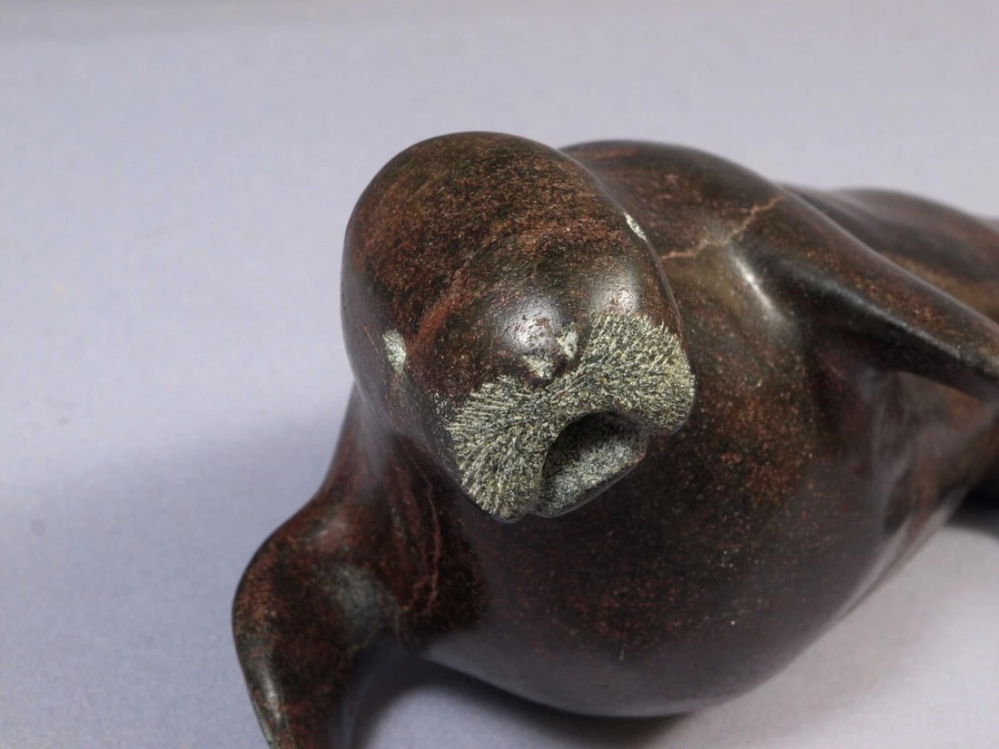 Soapstone Inuit Native Canada Figurine Walrus Sea Lion Signed Vintage Brownish: This is a vintage, Native American Canadian Inuit Figurine. The figurine shows a walrus or sea lion. It is nice dark brown color. The carving is app. 10" long and 5" tallIt is in good vintage