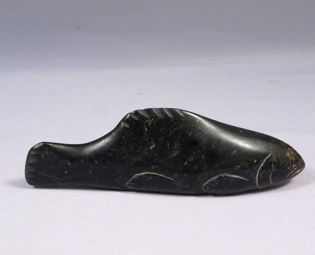 Inuit Native American Canada Figurine Fish Soapstone Stone SIGNED Eskimo sticker: This is a vintage, Primitive Native American Canadian Inuit Figurine. The figurine is made from soapstone and it is very beautiful. It is signed at the bottom under the Eskimo Art sticker with numbers